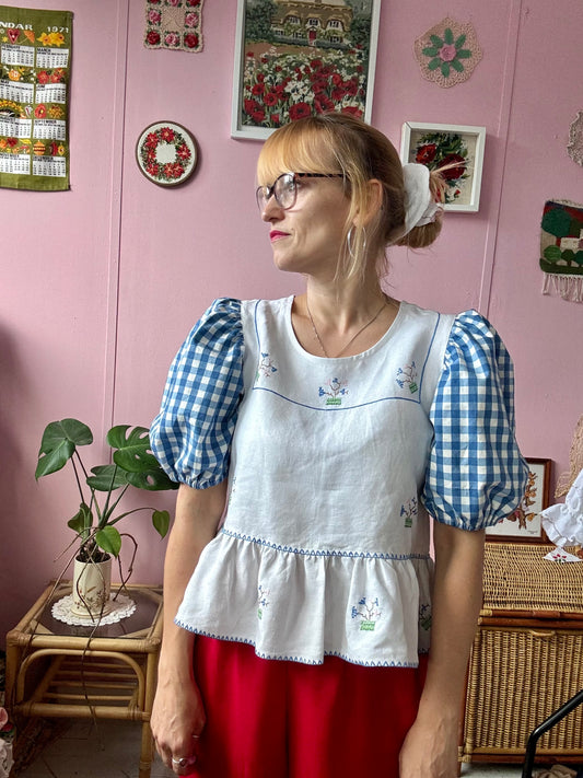 Peplum blouse with hand embroidery and gingham sleeves