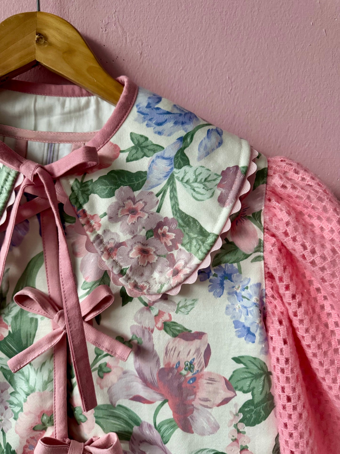 Floral jacket with pink sleeves
