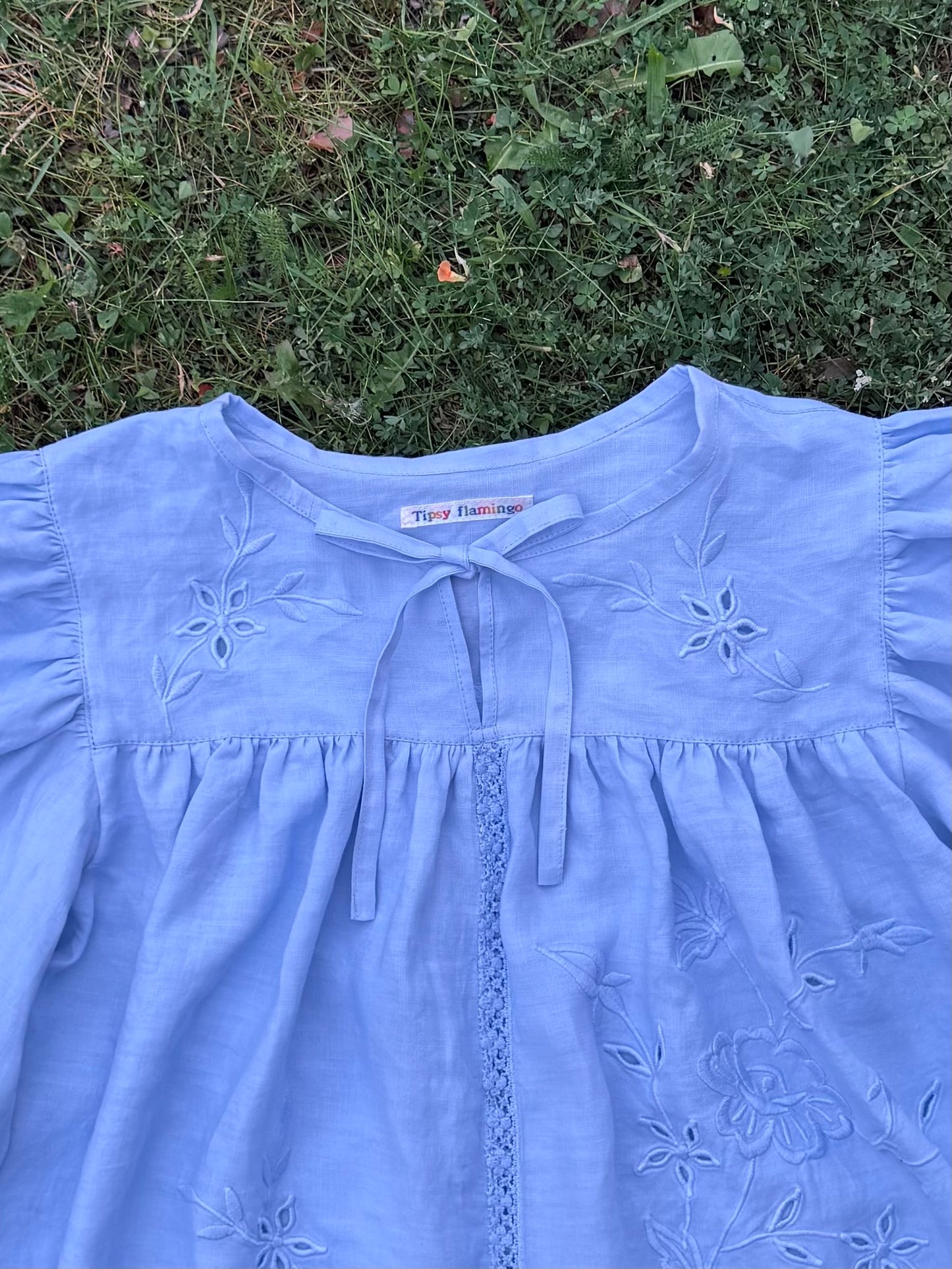 Light blue blouse with long sleeves