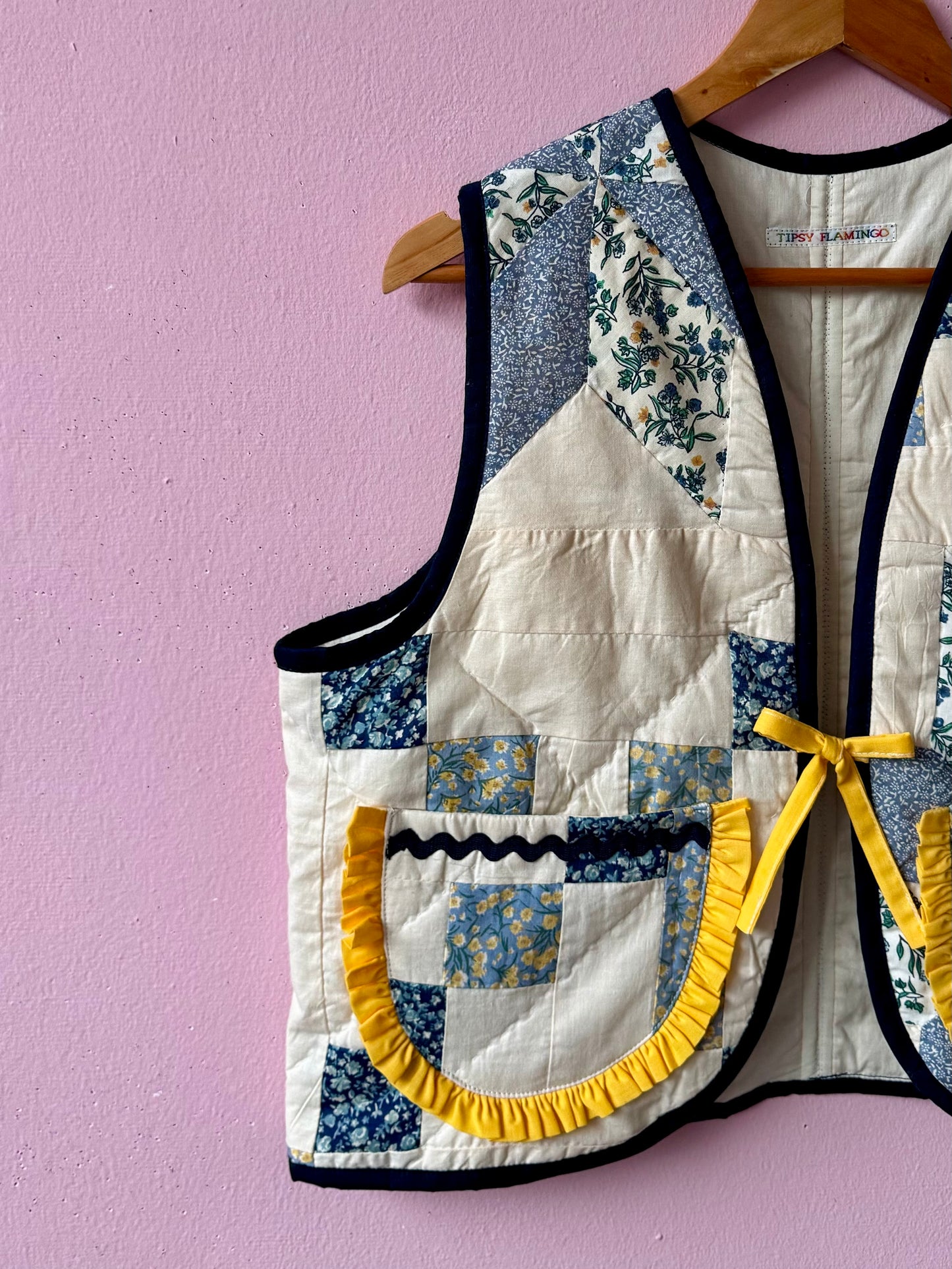 Blue/white vest with yellow trim