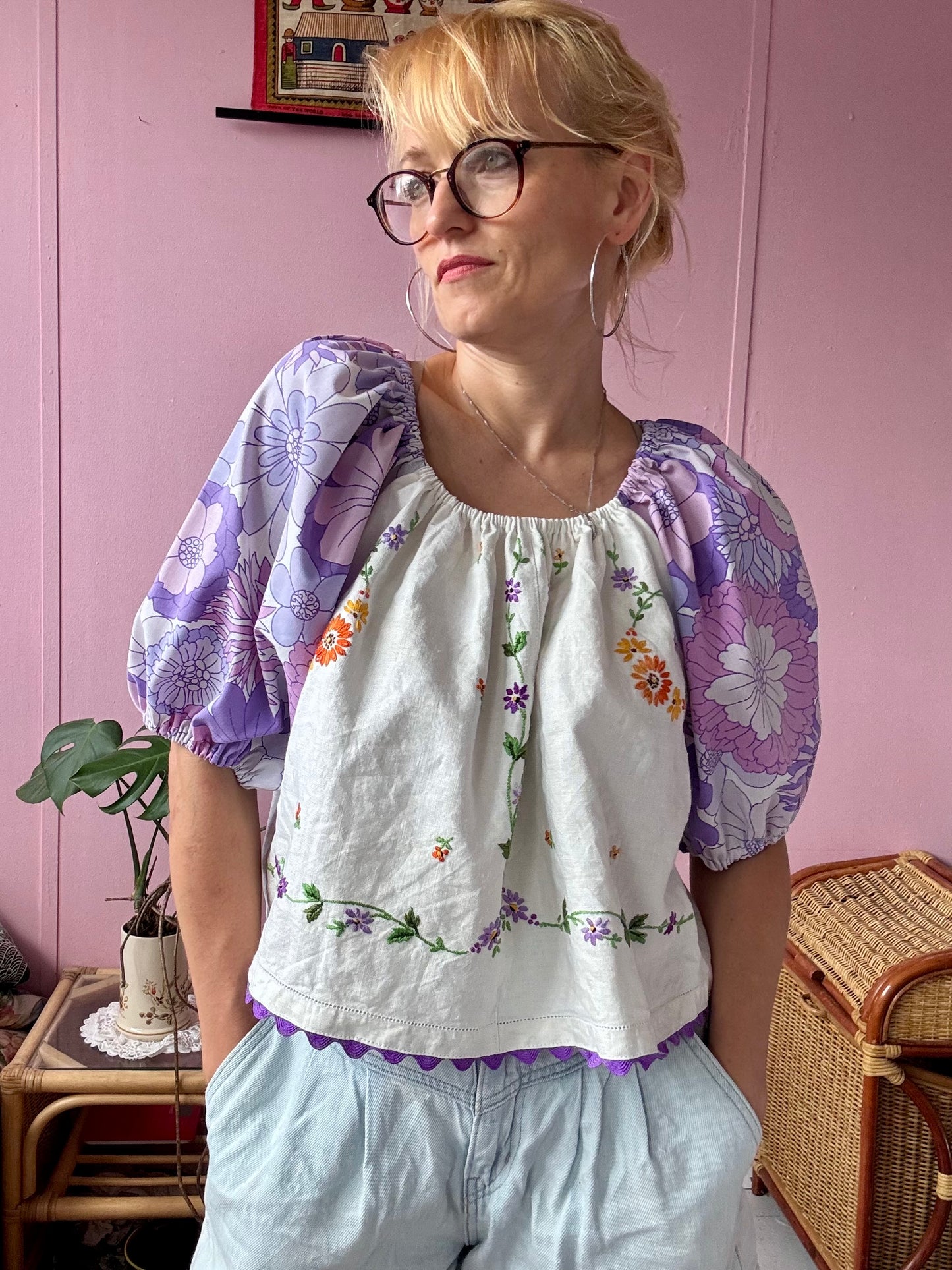 Floral blouse with purple floral sleeves