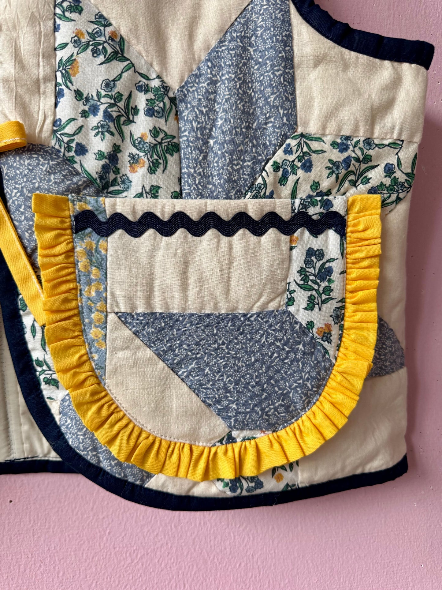 Blue/white vest with yellow trim