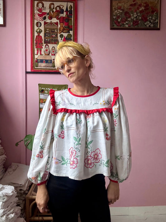 Floral blouse with red binding