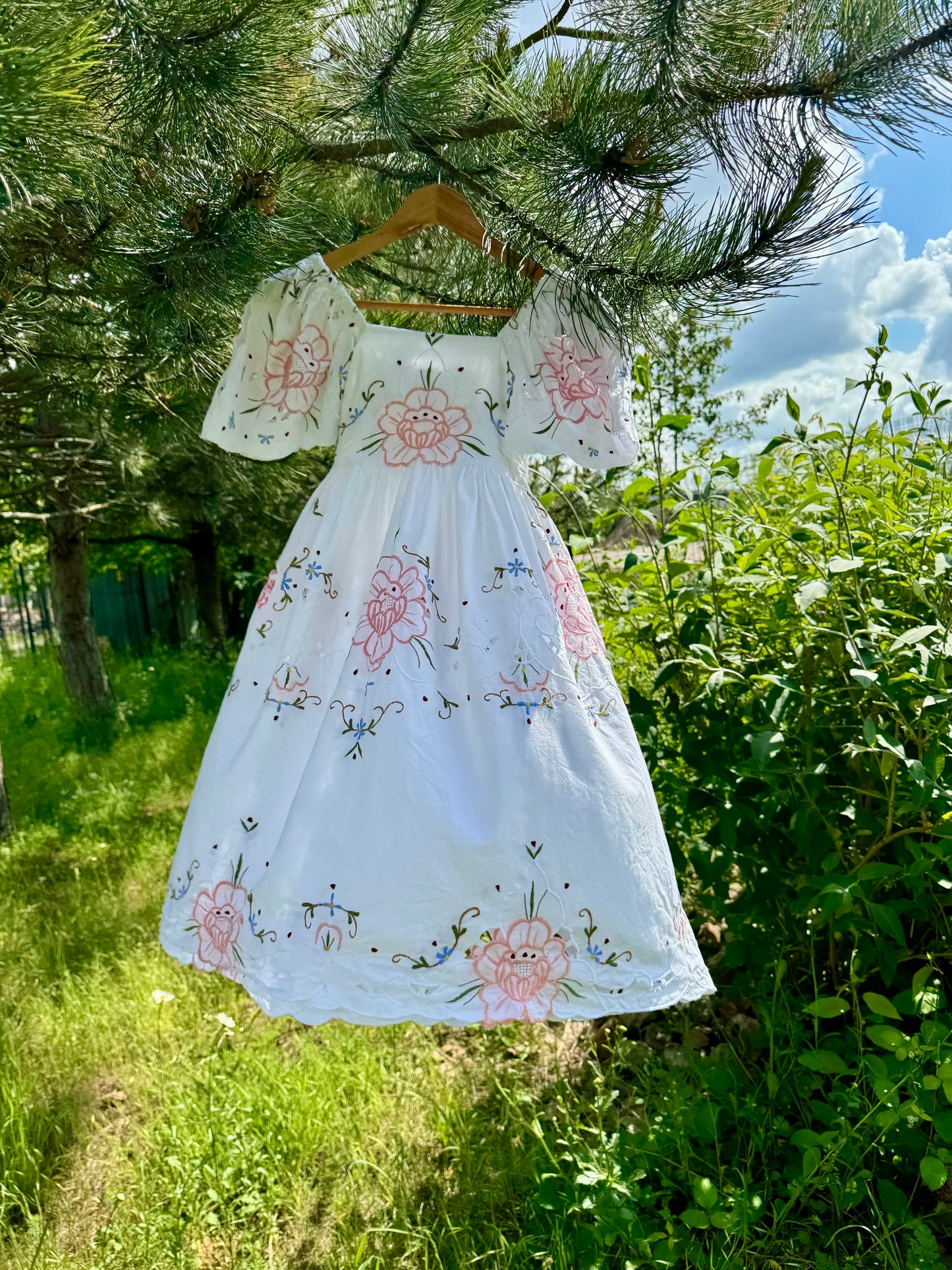 Short dress with floral cut out embroidery