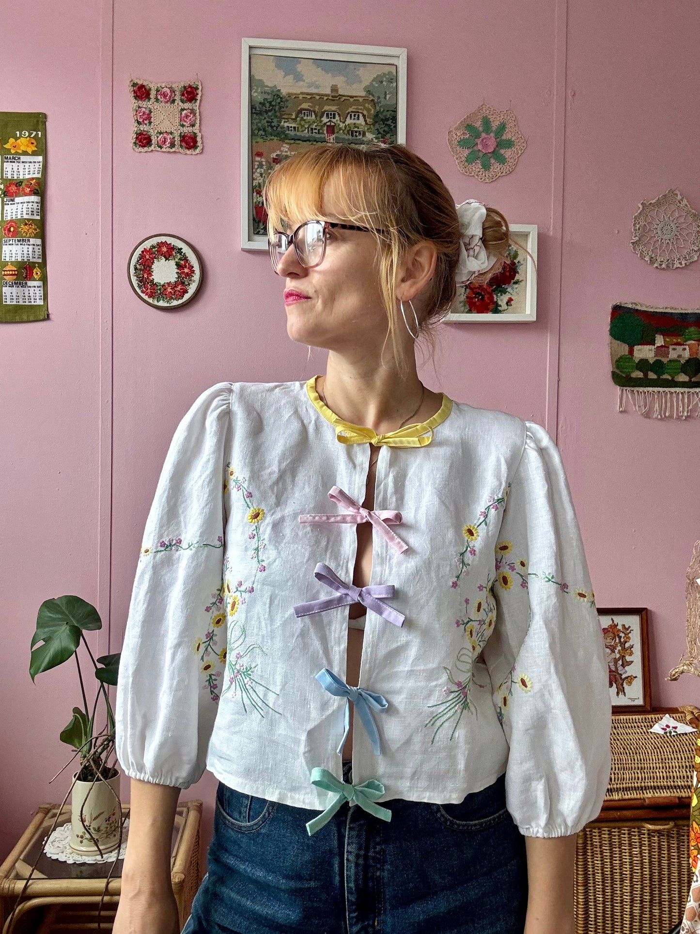 Linen blouse with yellow floral embroidery and rainbow bows