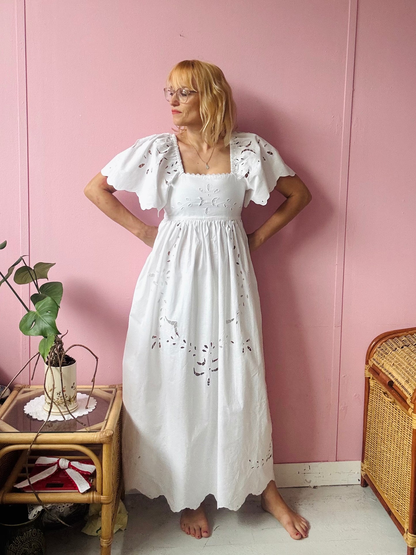 All white maxi dress with cut out embroidery