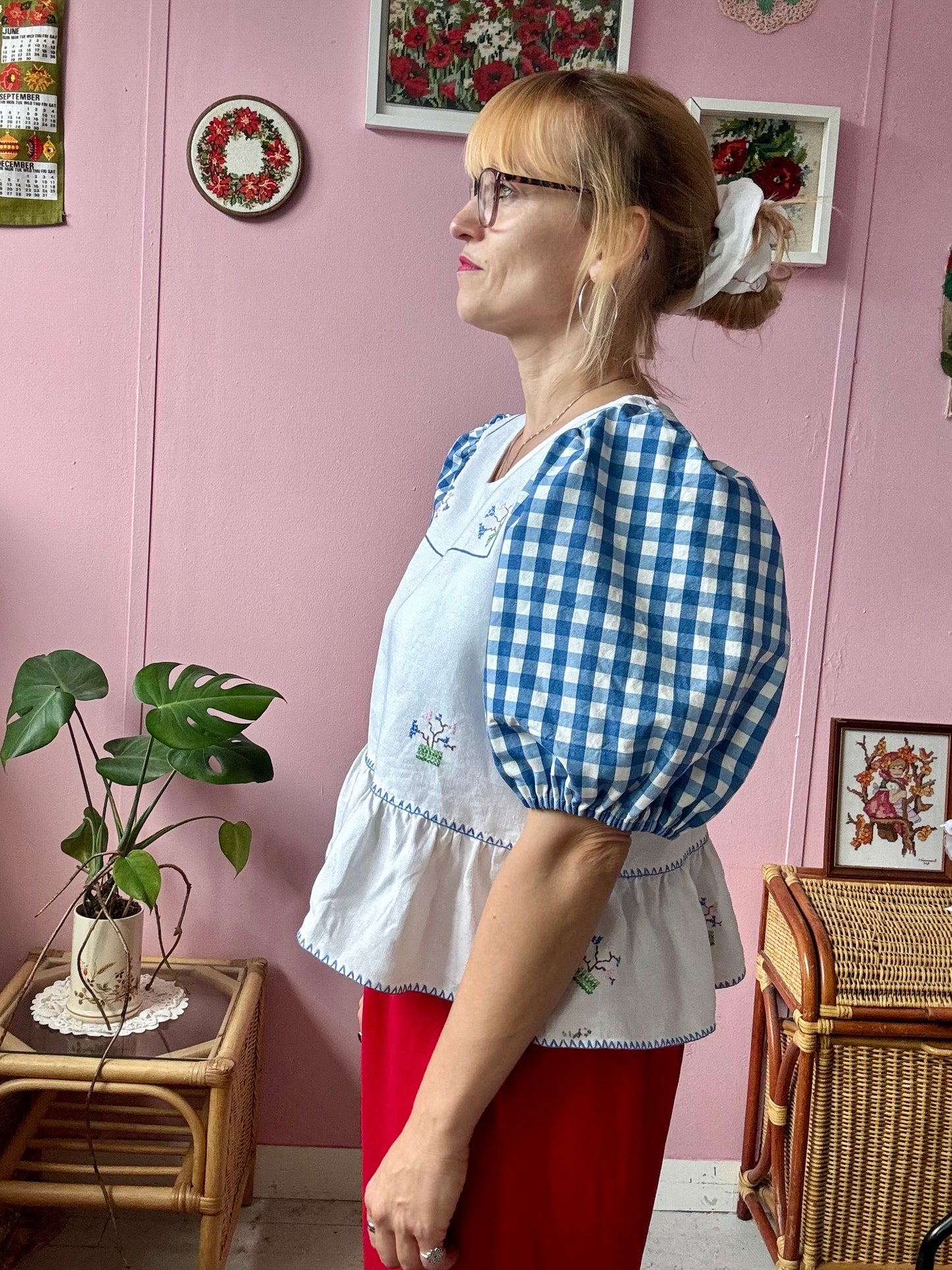 Peplum blouse with hand embroidery and gingham sleeves