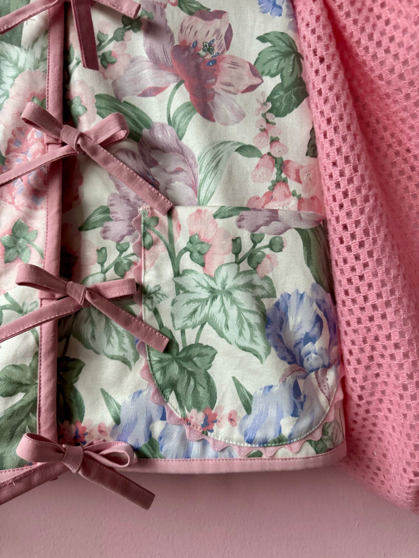 Floral jacket with pink sleeves