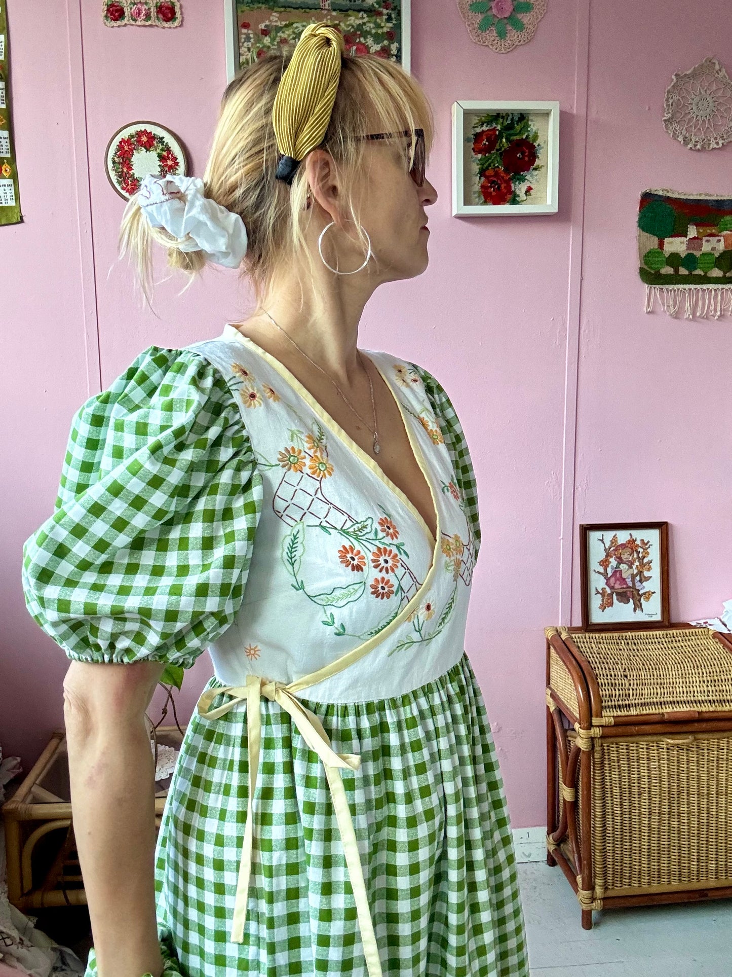 Wrap around dress with green gingham and embroidery