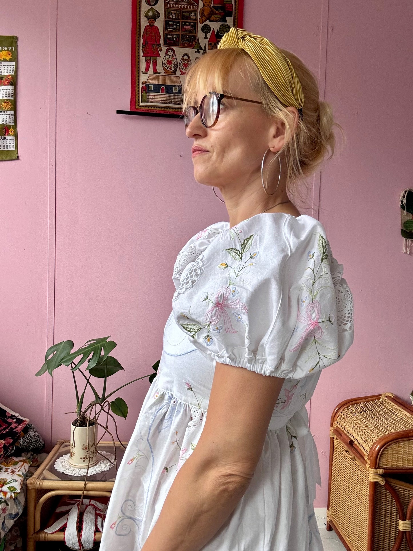 White maxi dress with floral embroidery and puffy sleeves