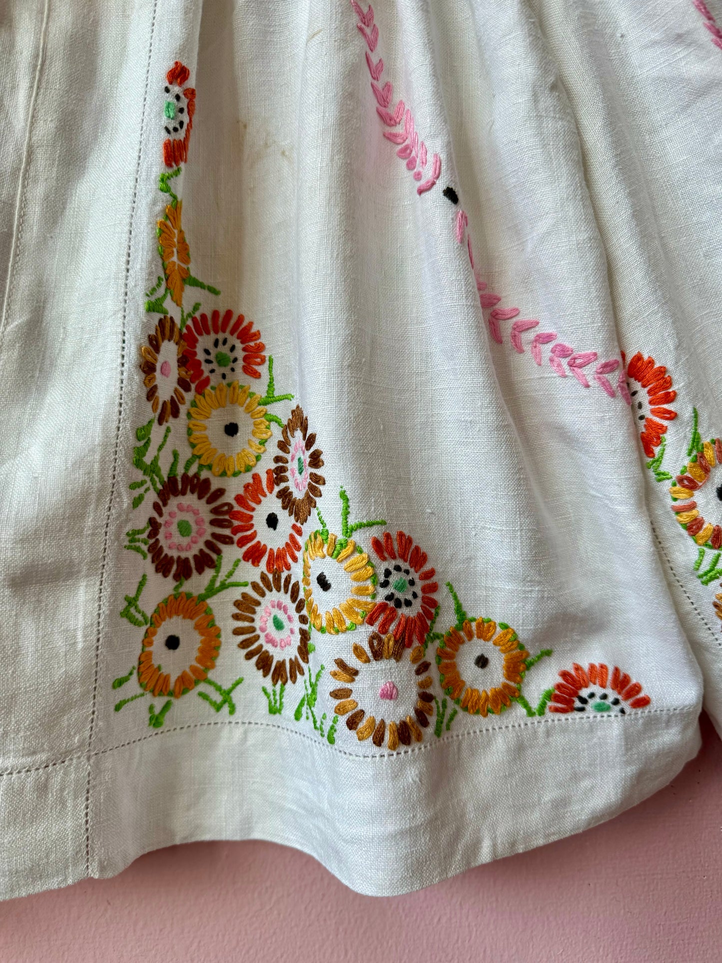 Linen blouse with floral embroidery and yellow binding