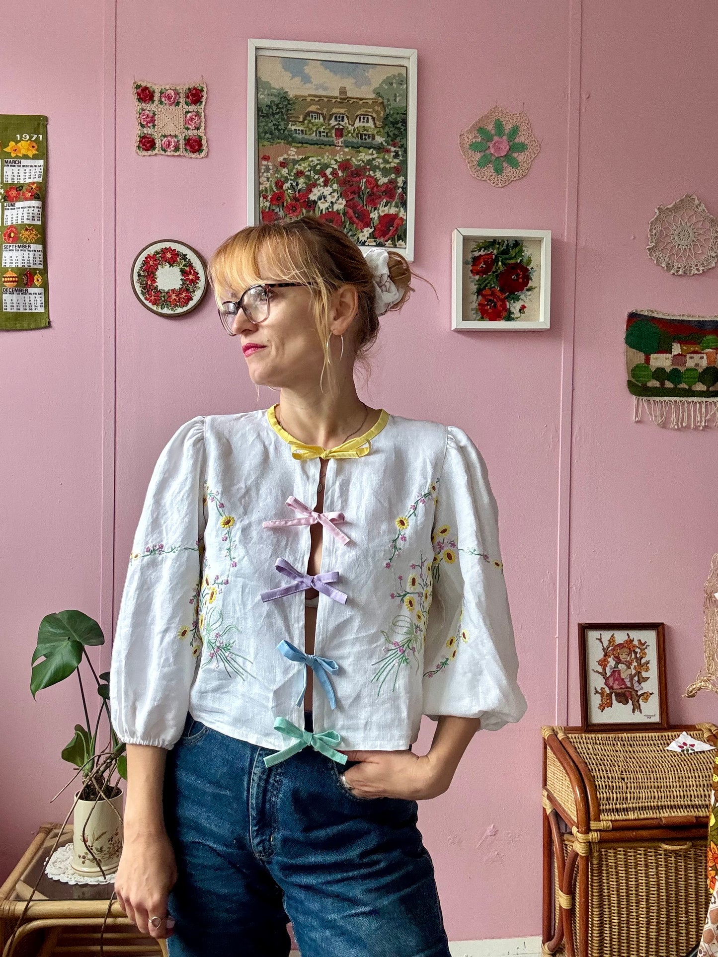 Linen blouse with yellow floral embroidery and rainbow bows