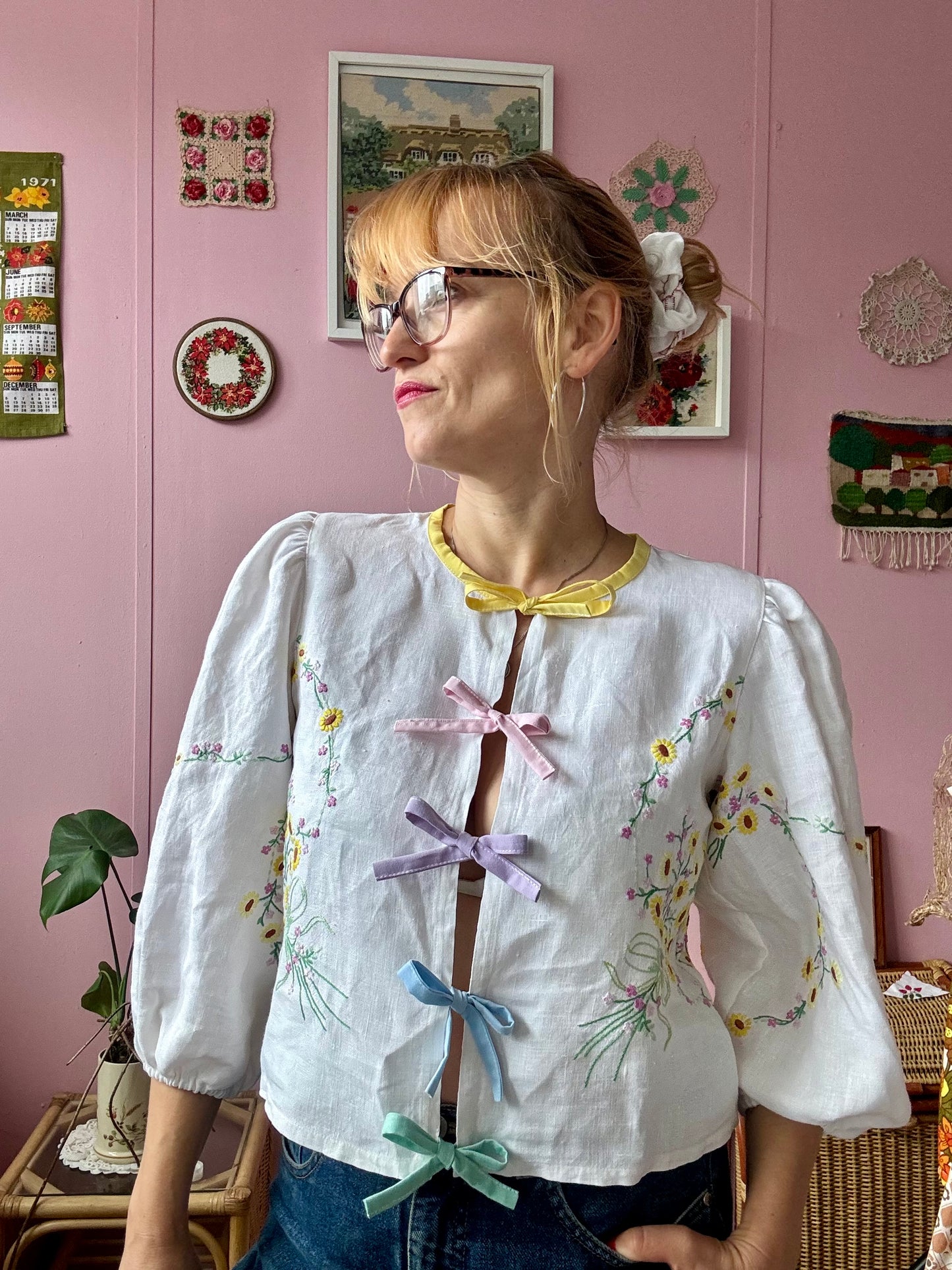 Linen blouse with yellow floral embroidery and rainbow bows