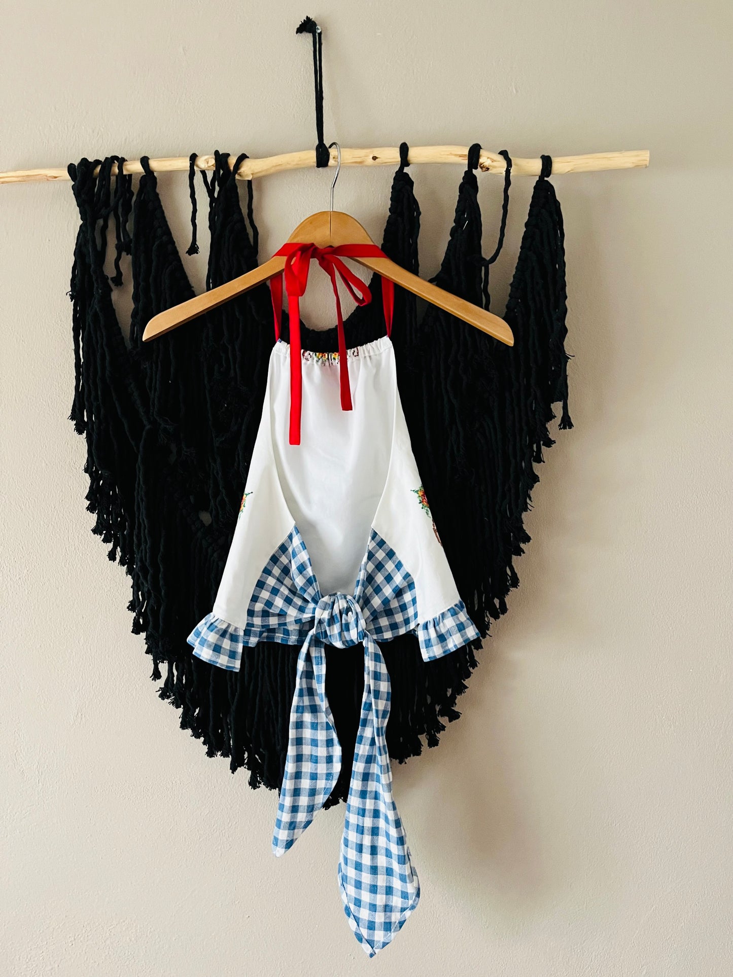Cross stitch halter neck top with blue gingham back straps and frill