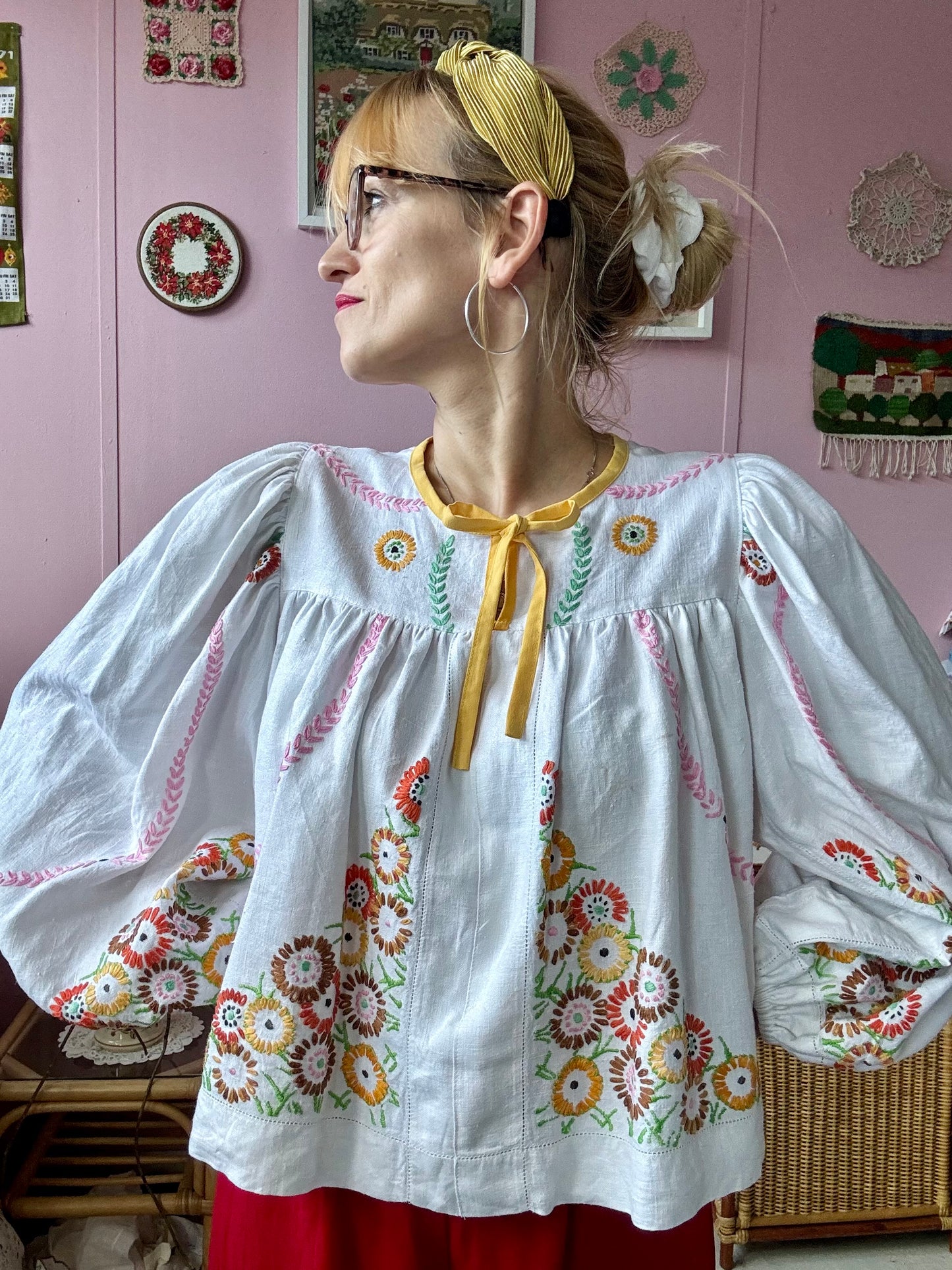 Linen blouse with floral embroidery and yellow binding