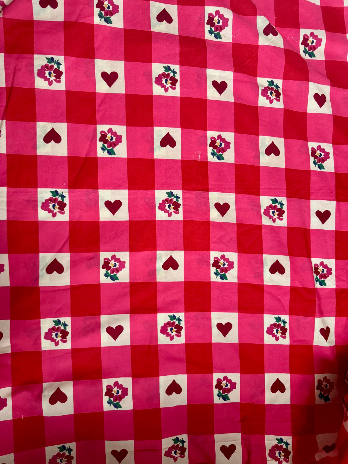 Pink/red dress with frills and ric rac