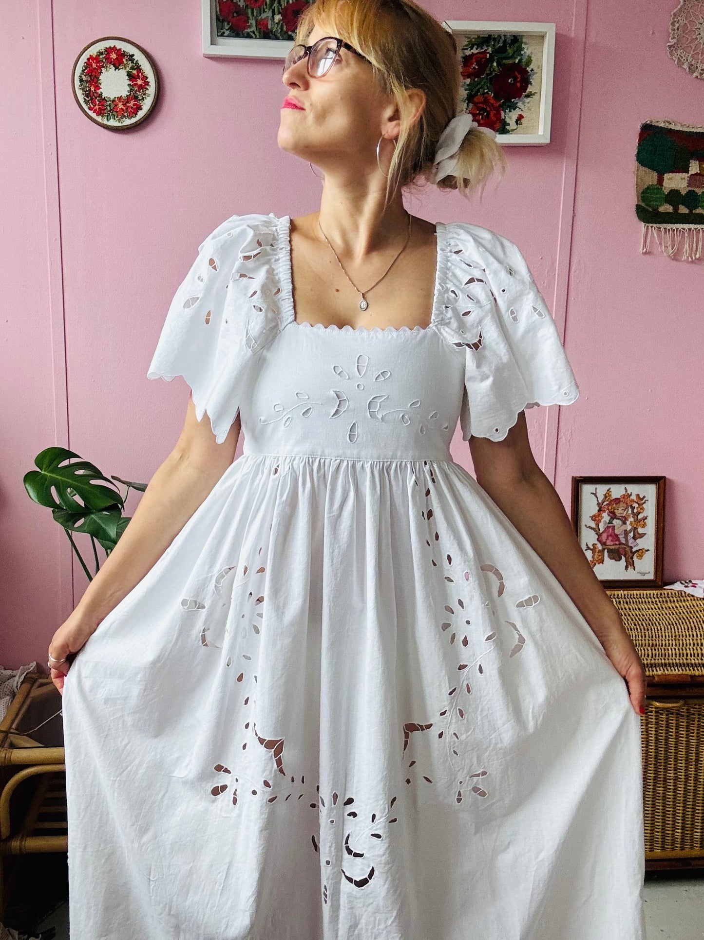 All white maxi dress with cut out embroidery