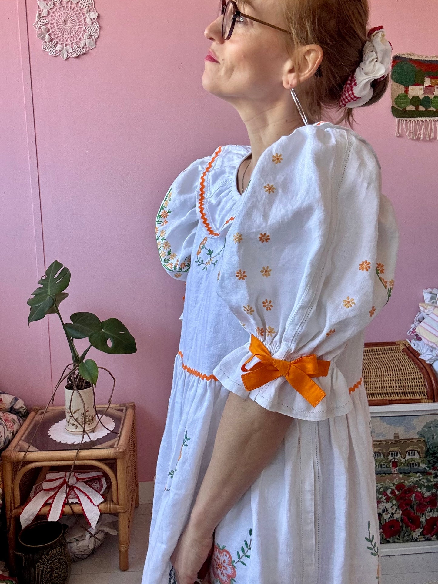 Linen dress with floral hand embroidery and ric rac