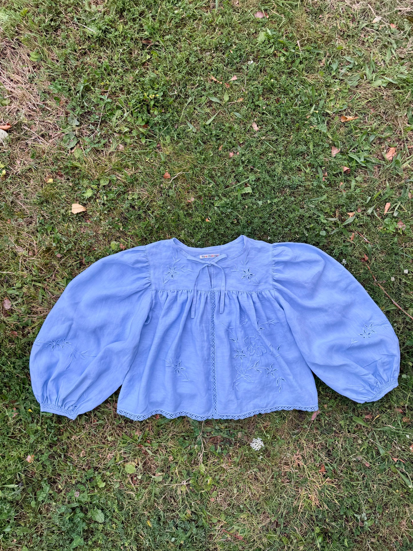 Light blue blouse with long sleeves