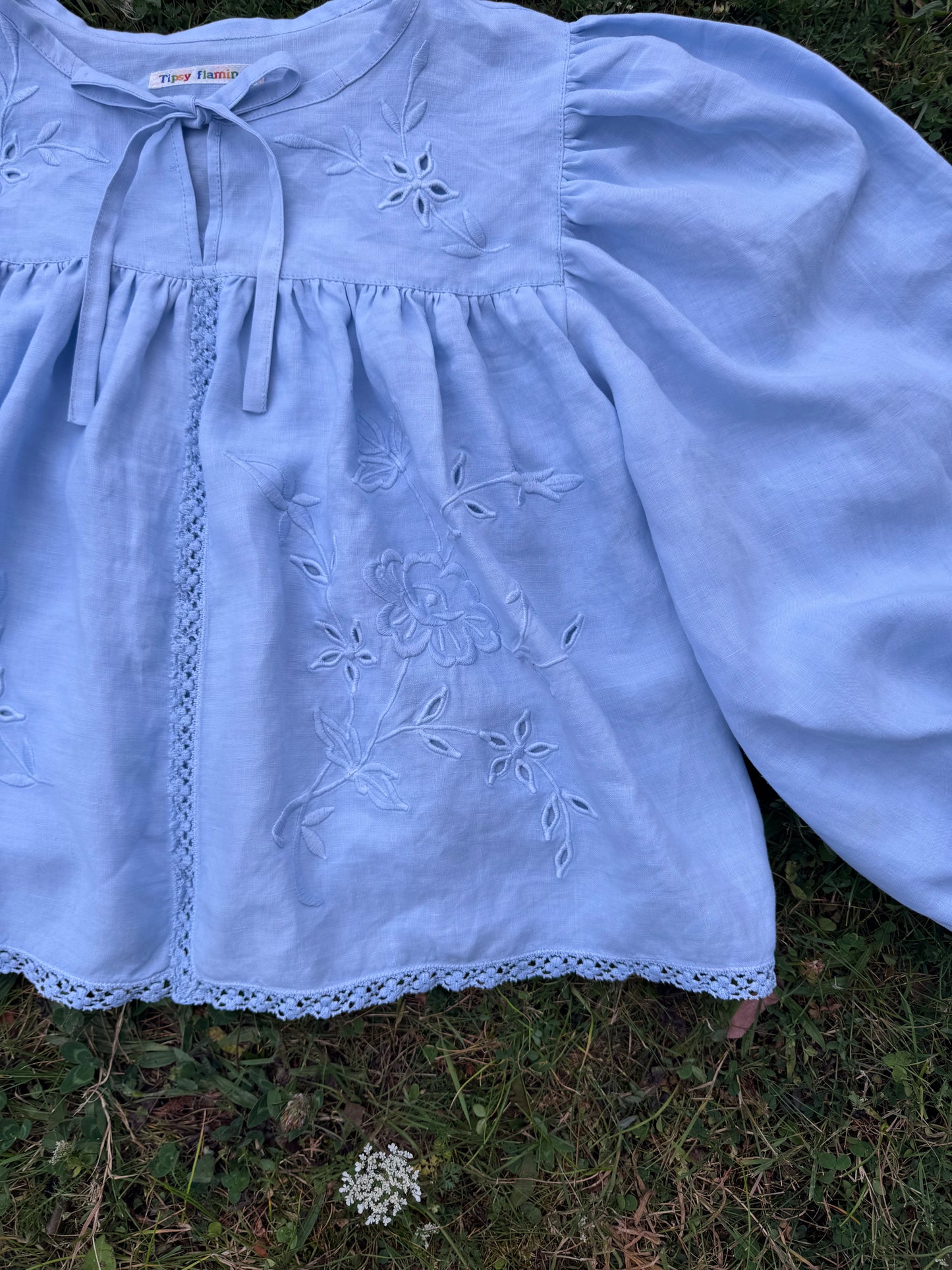 Light blue blouse with long sleeves