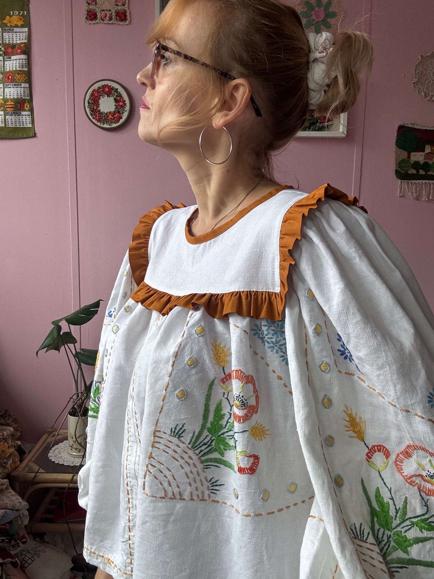 White linen blouse with hand embroidery