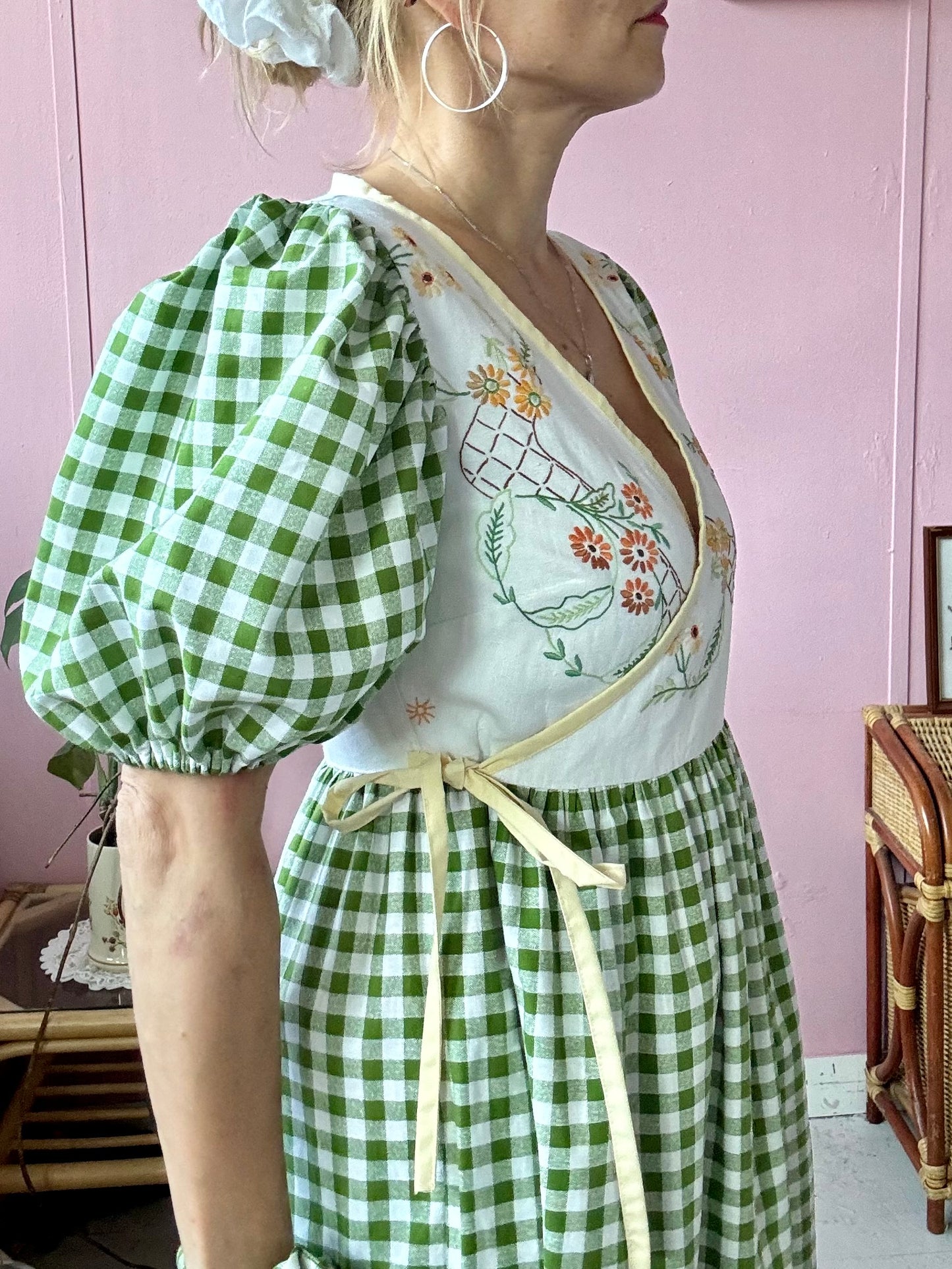 Wrap around dress with green gingham and embroidery