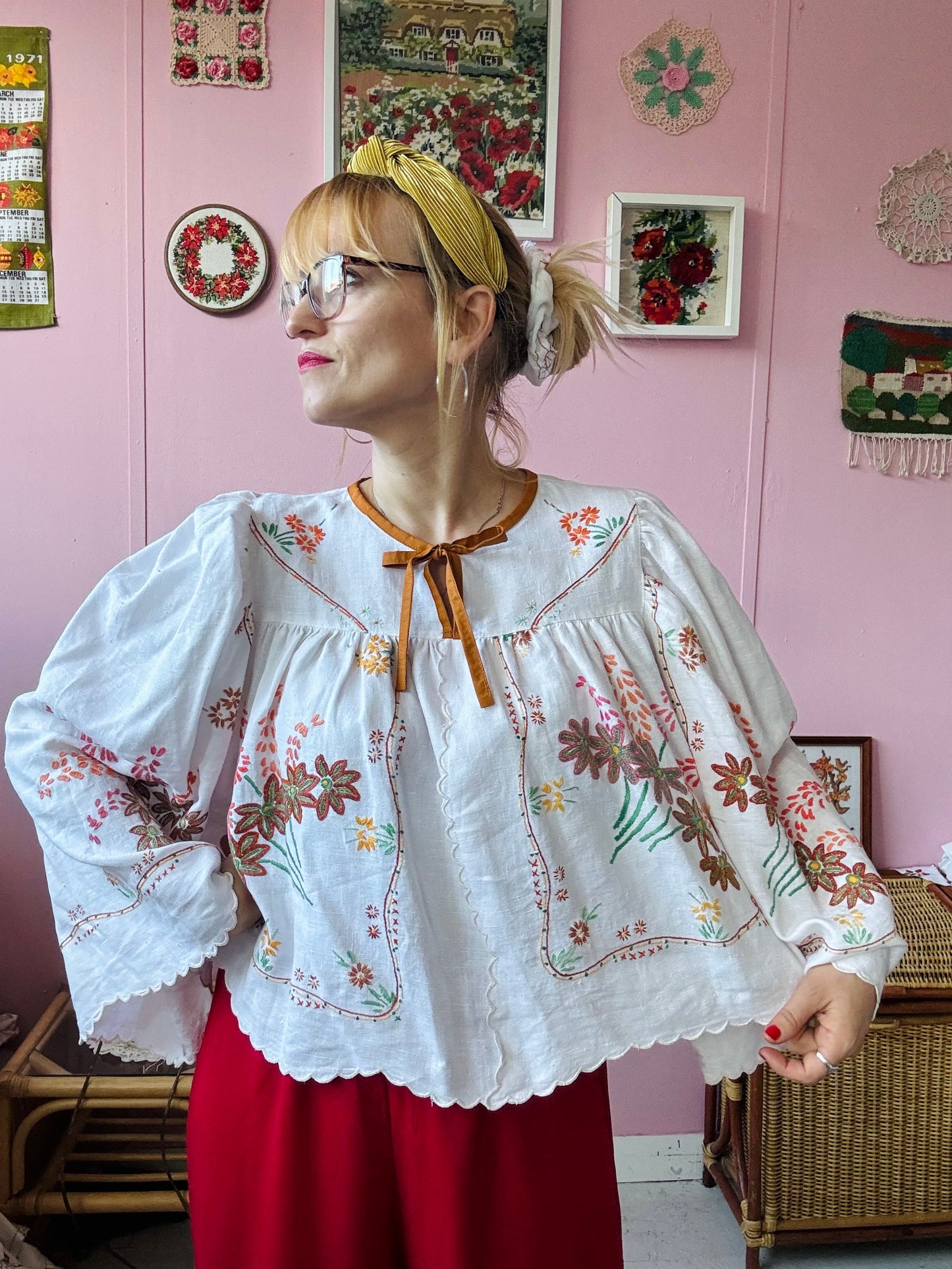 Linen blouse with floral embroidery and wide sleeves