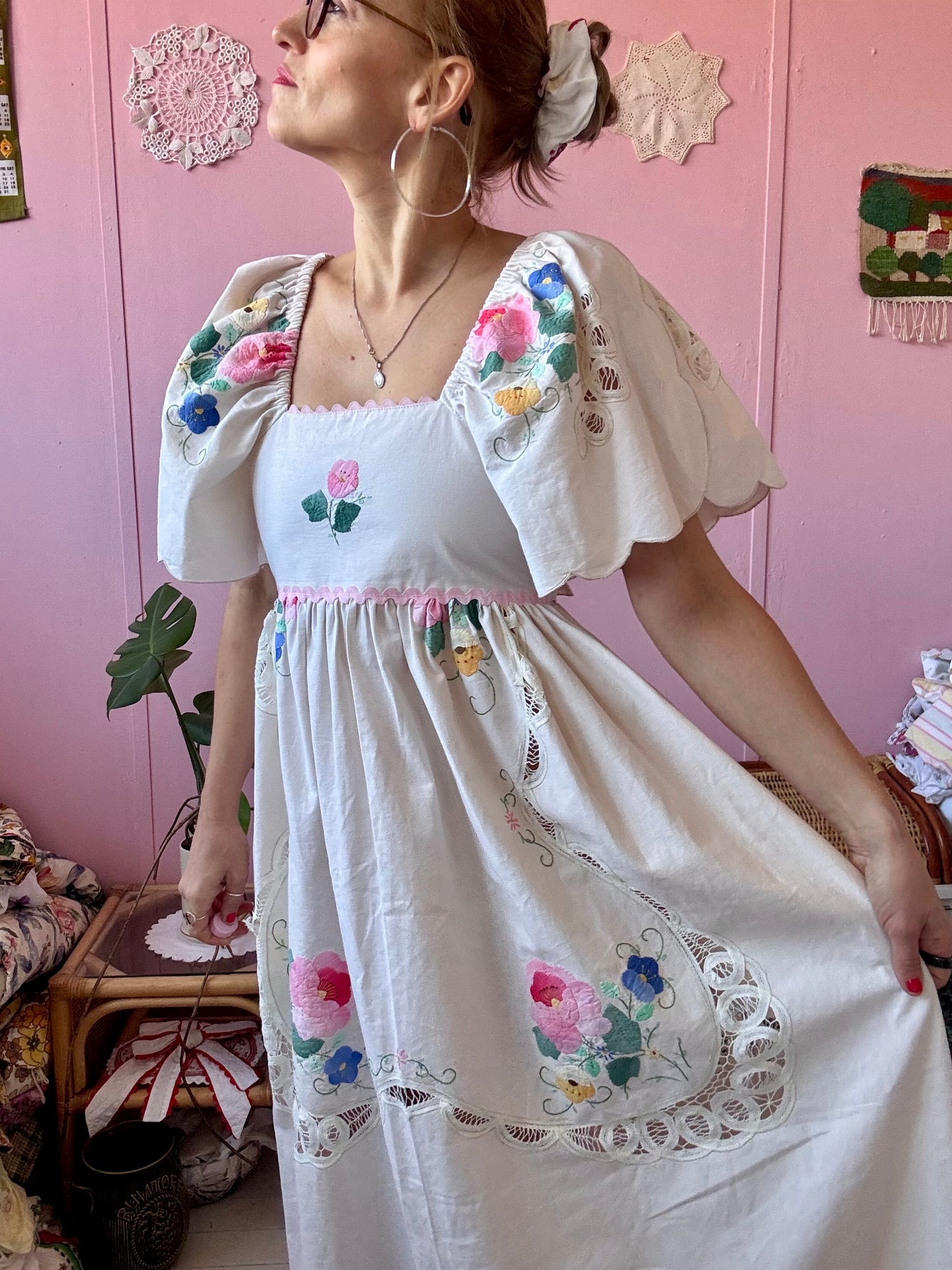Cream maxi dress with floral appliqués