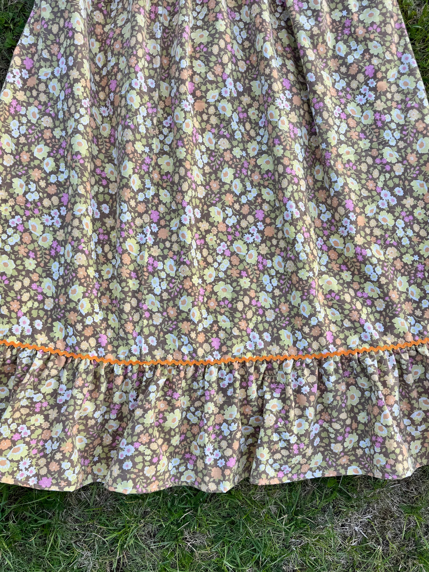 Floral maxi dress with orange frill