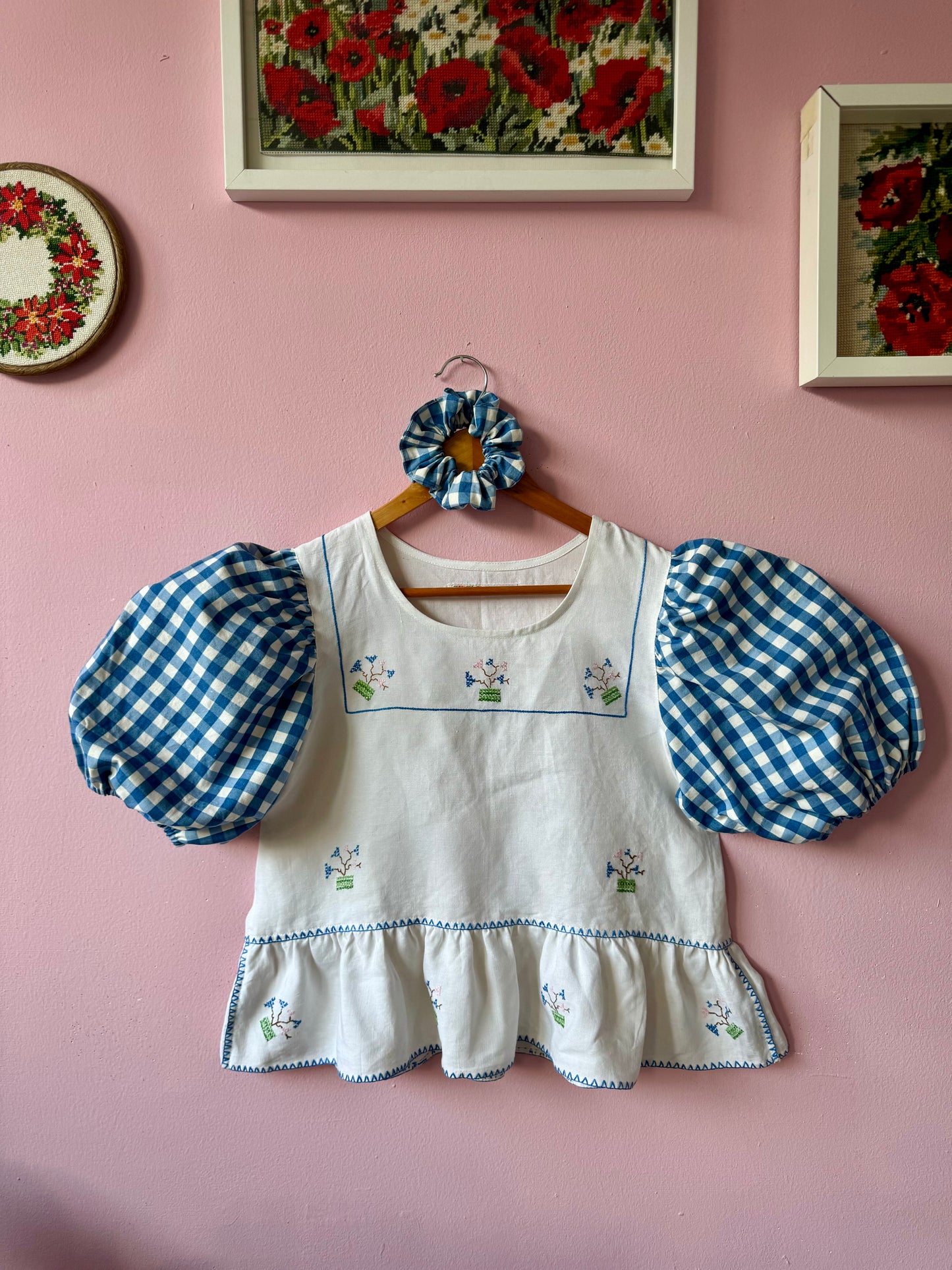 Peplum blouse with hand embroidery and gingham sleeves