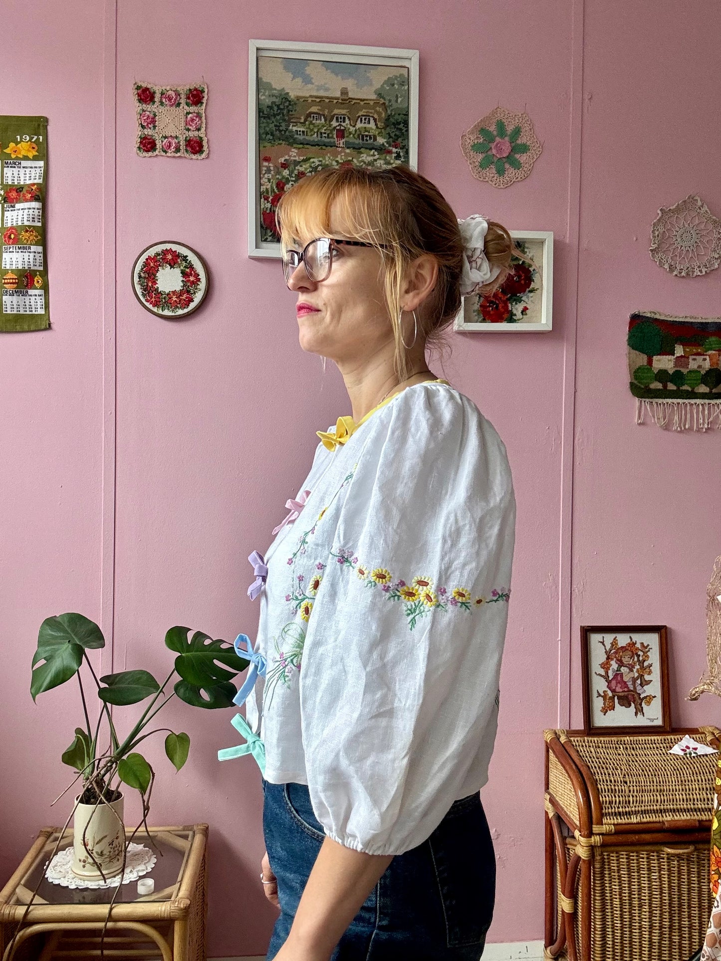 Linen blouse with yellow floral embroidery and rainbow bows