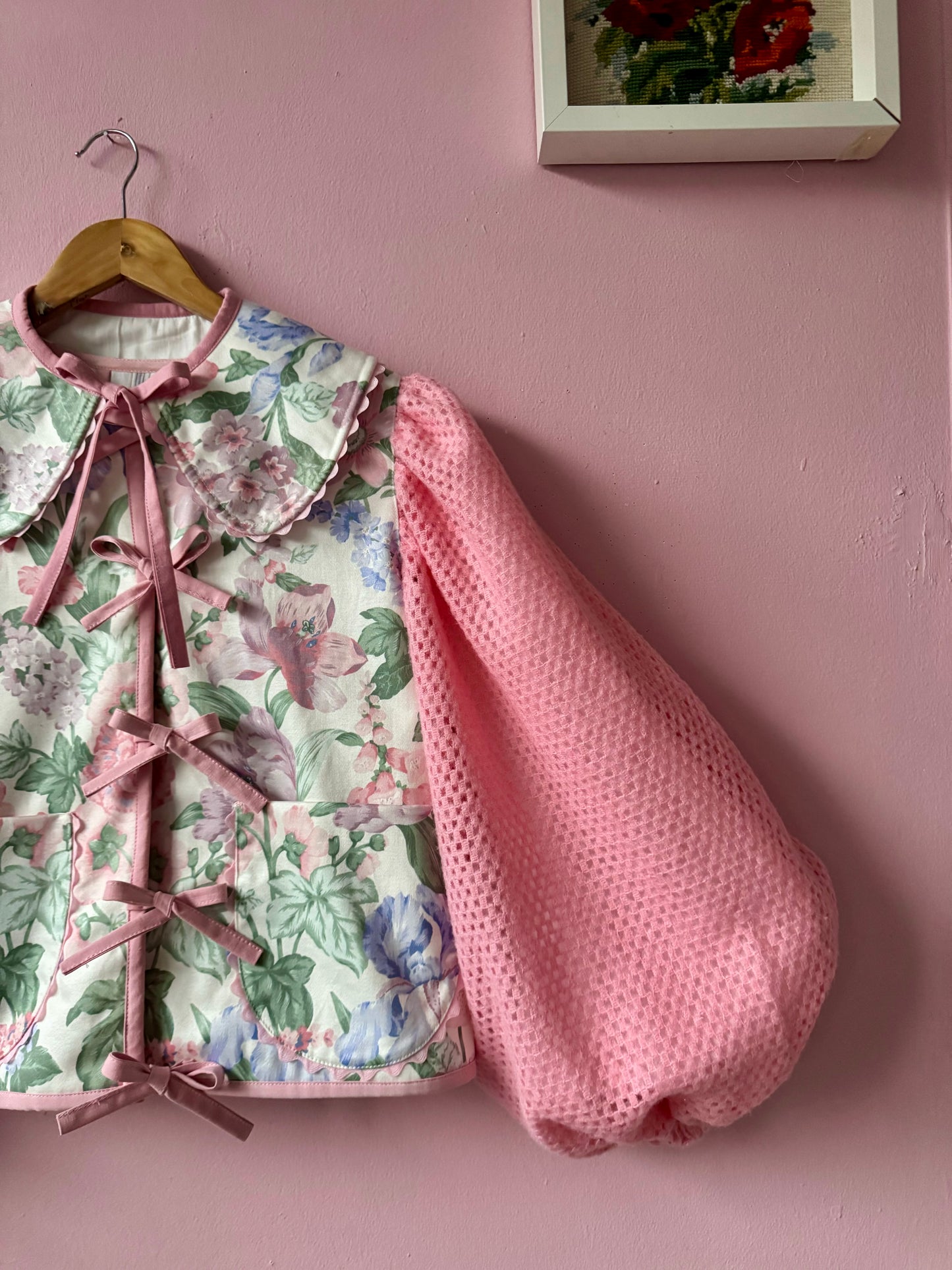 Floral jacket with pink sleeves
