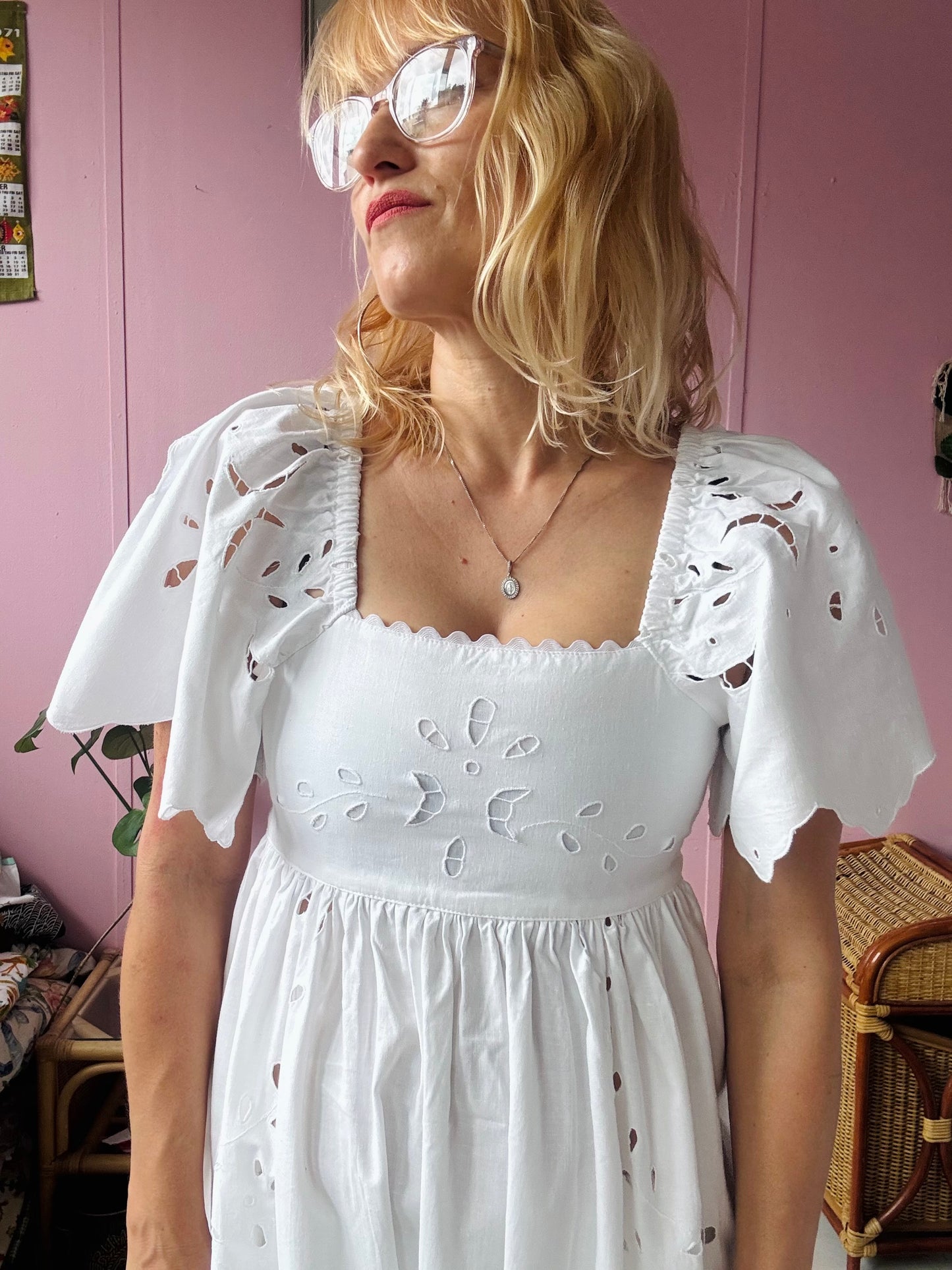 All white maxi dress with cut out embroidery