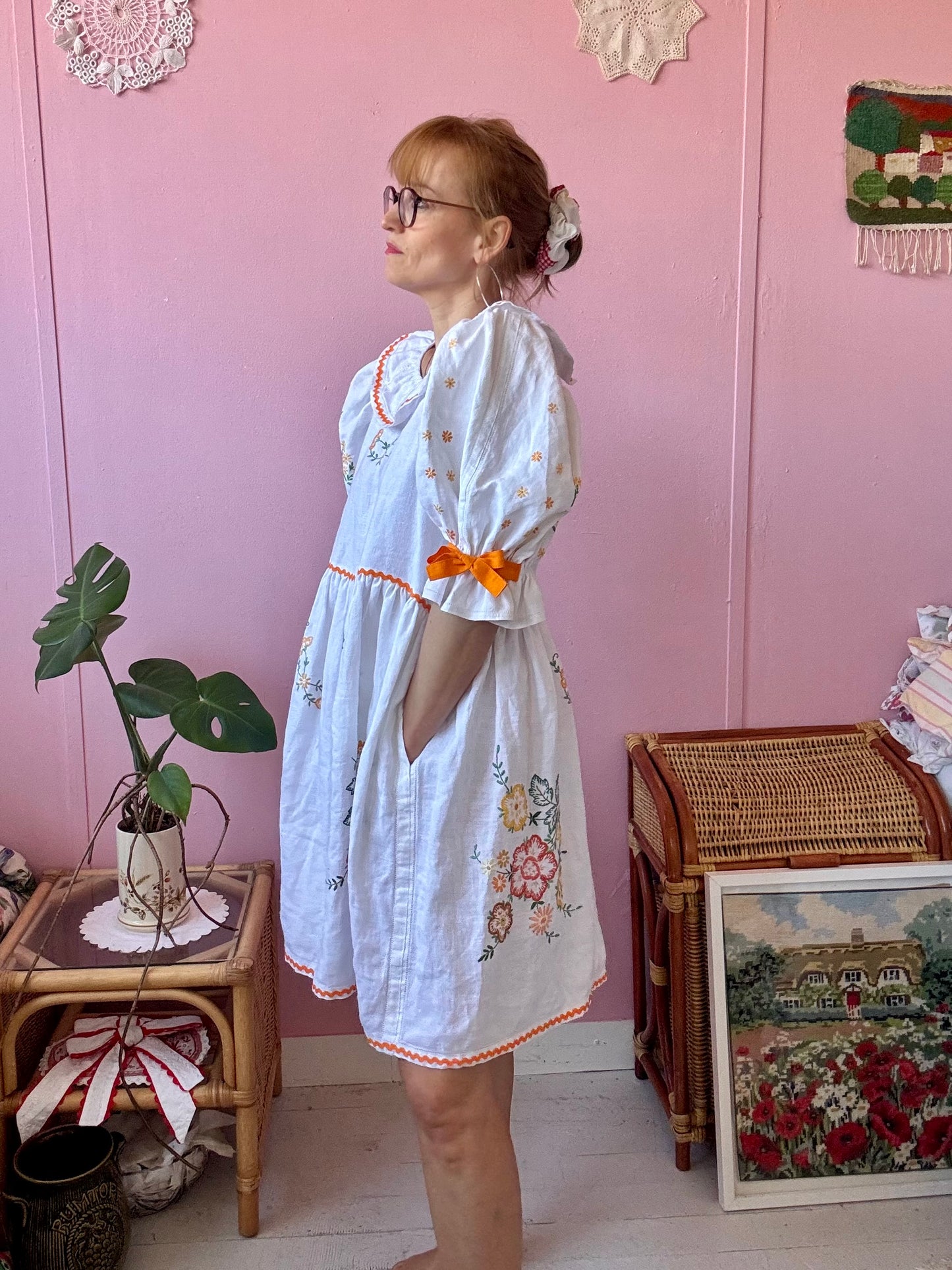 Linen dress with floral hand embroidery and ric rac