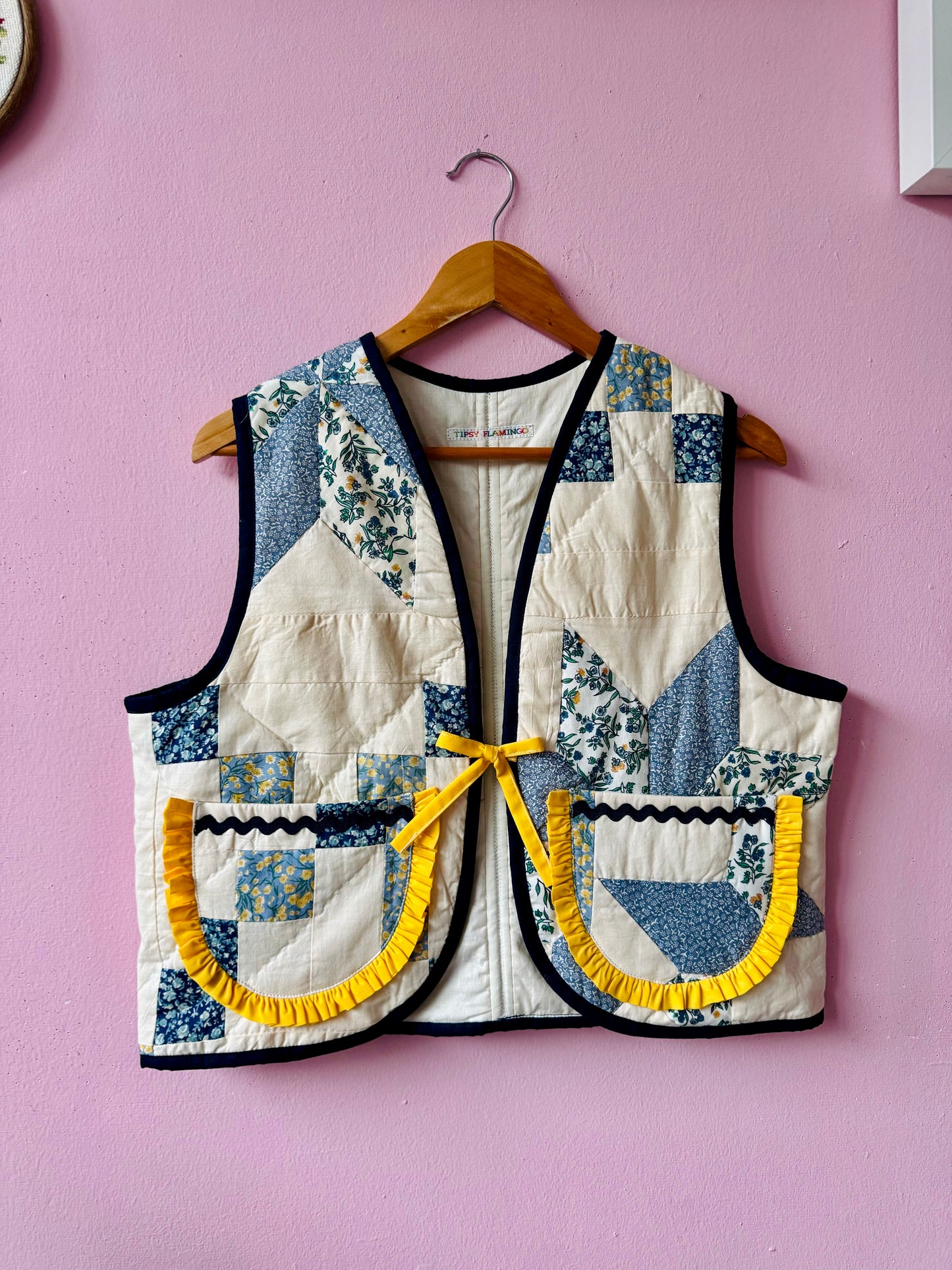 Blue/white vest with yellow trim