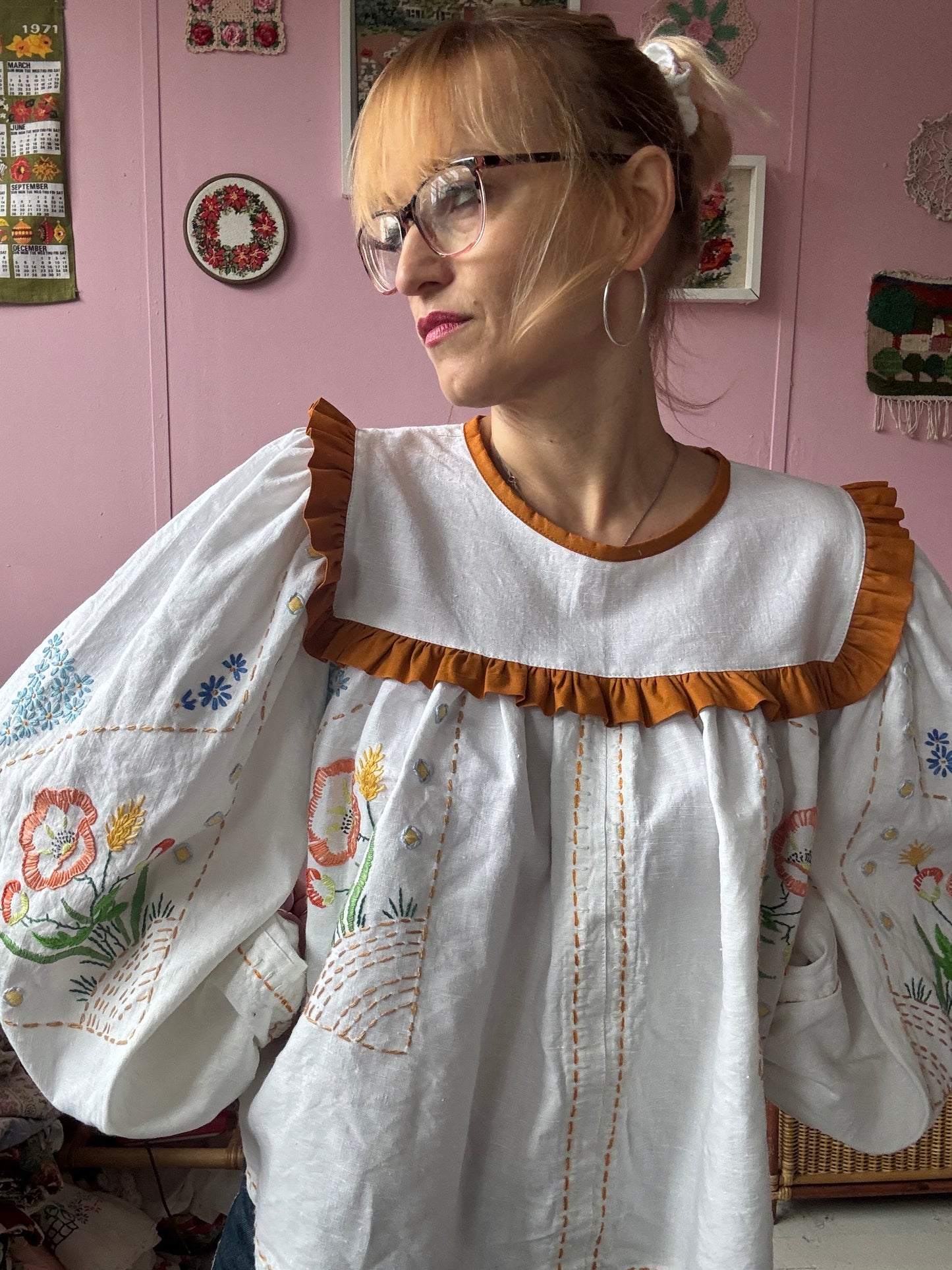 White linen blouse with hand embroidery