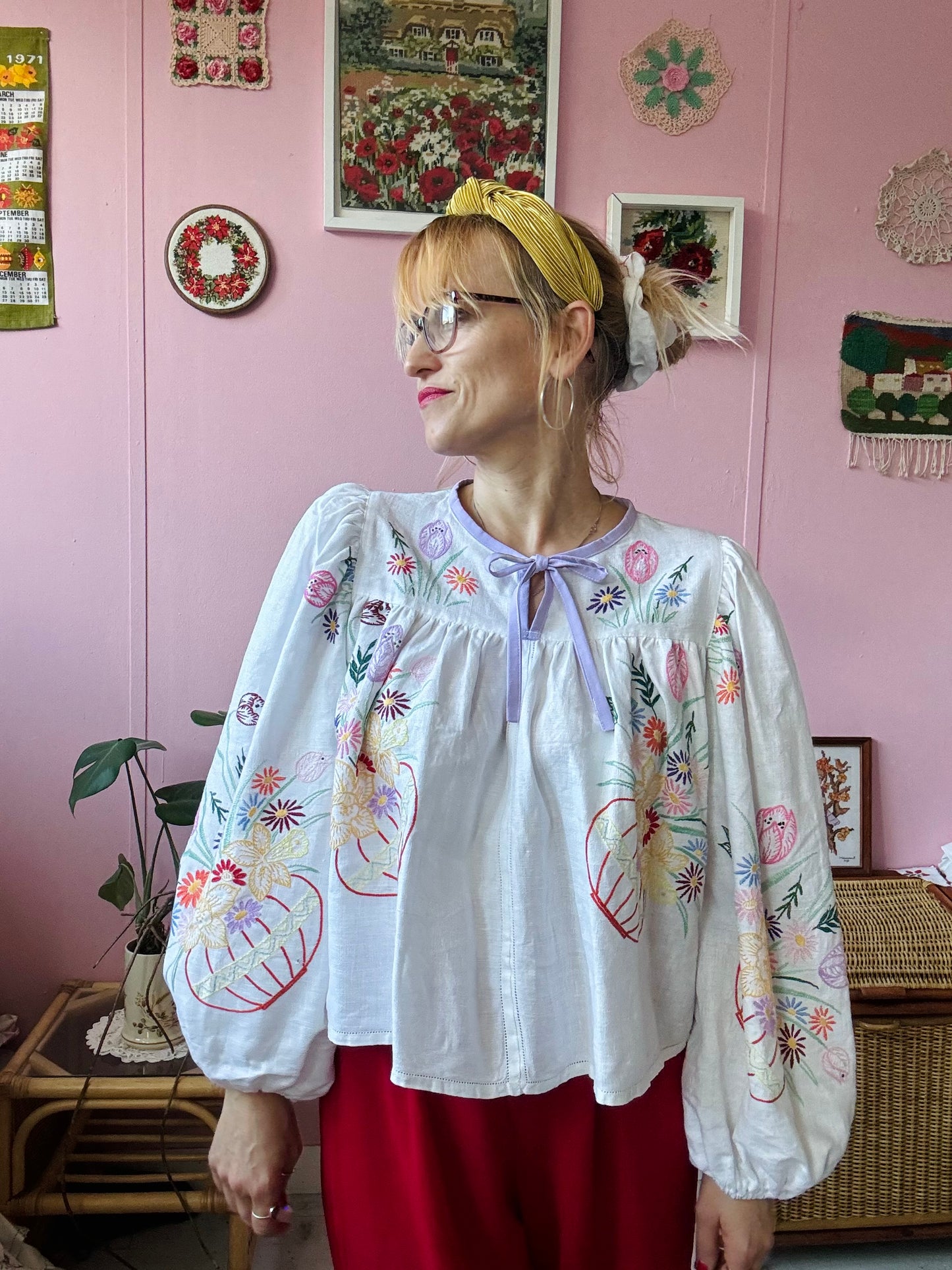 White linen blouse with baskets embroidery and lilac binding