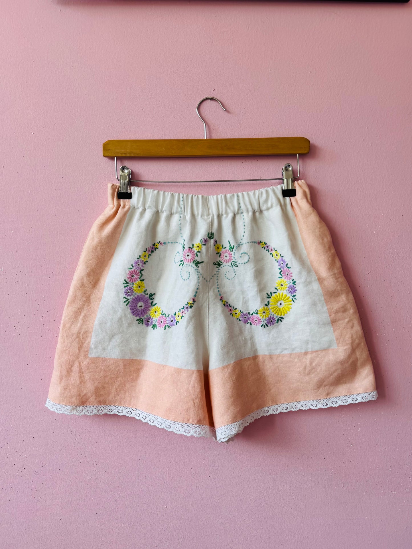 Floral shorts with salmon pink borders