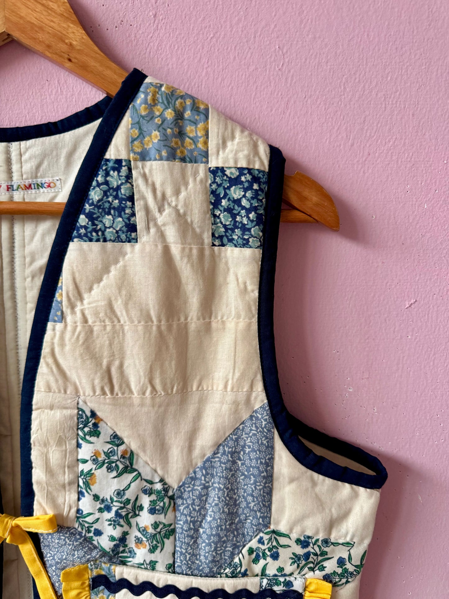 Blue/white vest with yellow trim