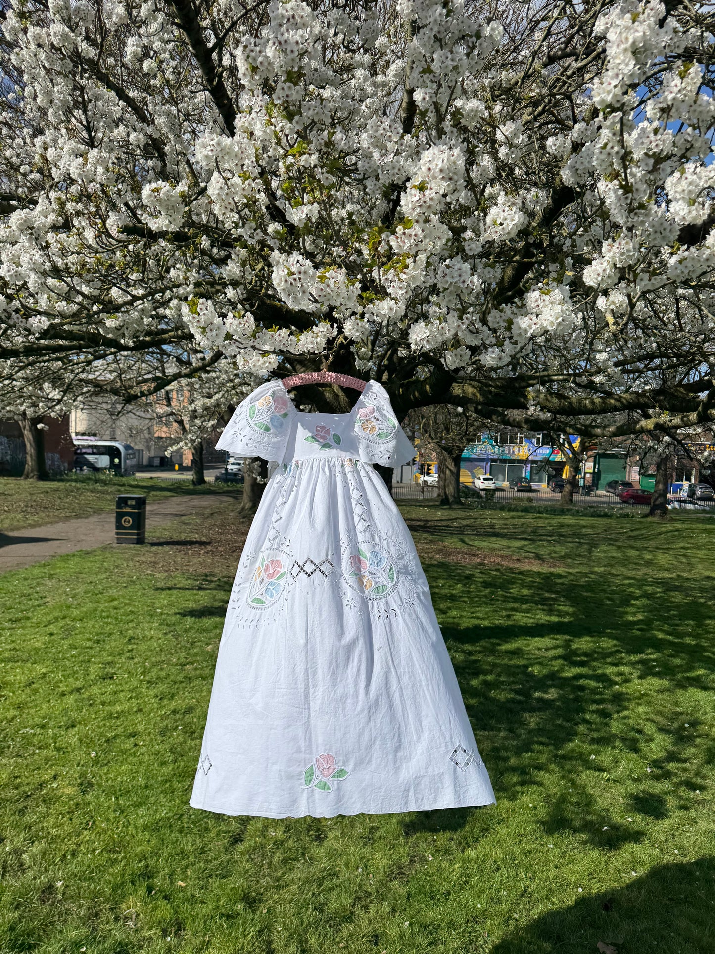 White maxi with pastel embroidery and cut out embroidery