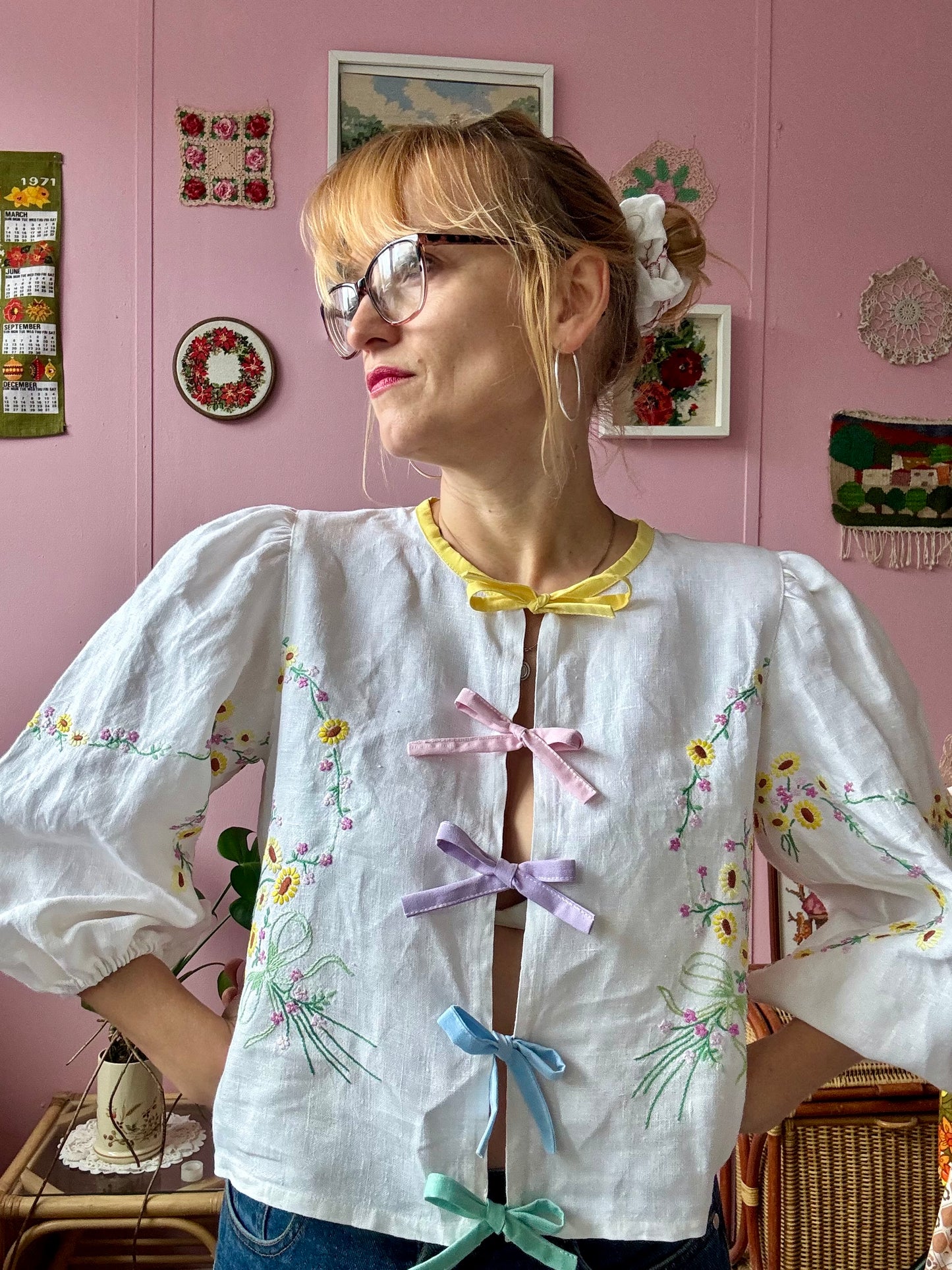 Linen blouse with yellow floral embroidery and rainbow bows