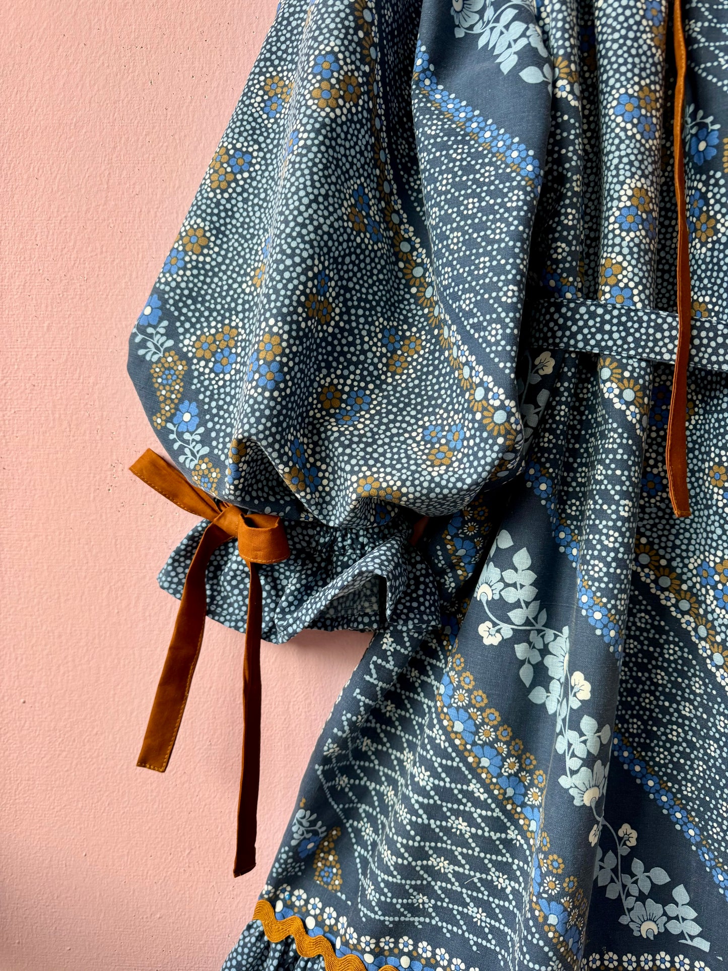 Blue and brown dress with long sleeves