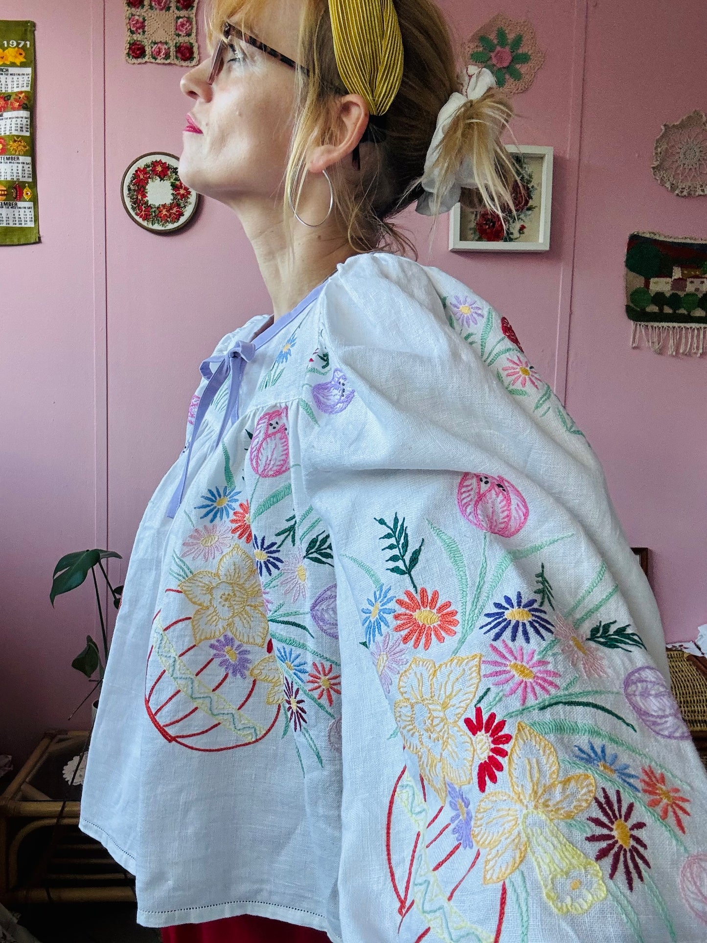 White linen blouse with baskets embroidery and lilac binding