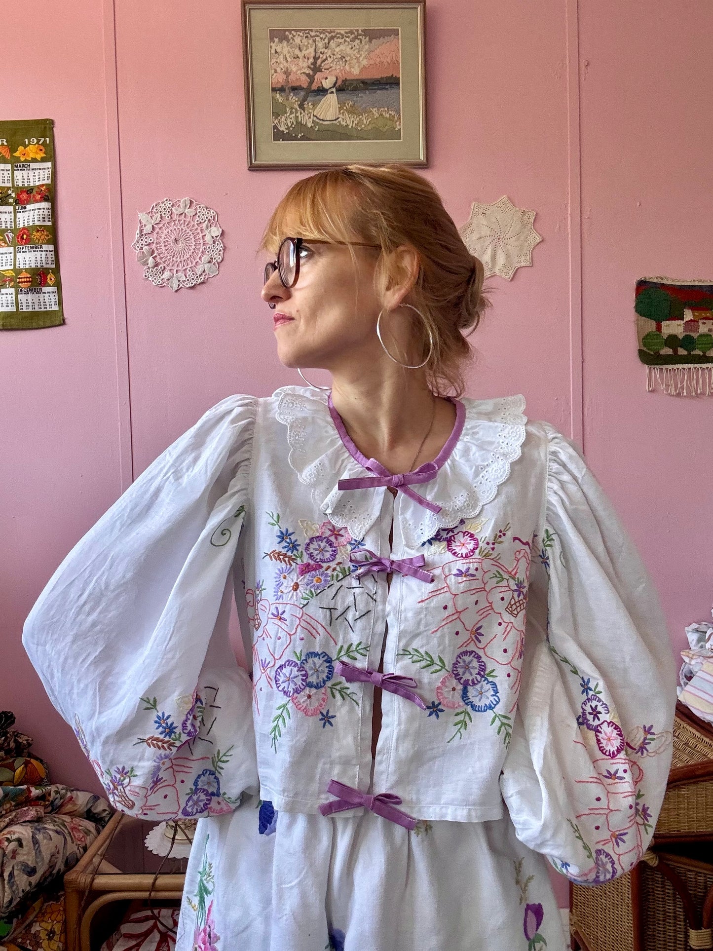 Blouse with lace neckline and lilac trimming