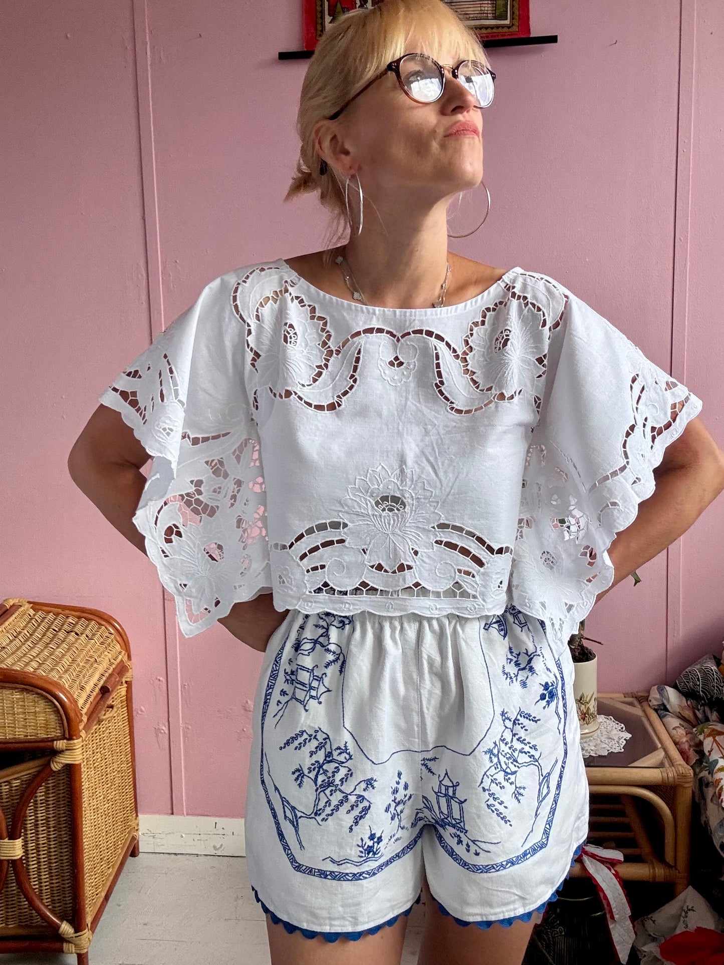 White shorts with blue hand embroidery