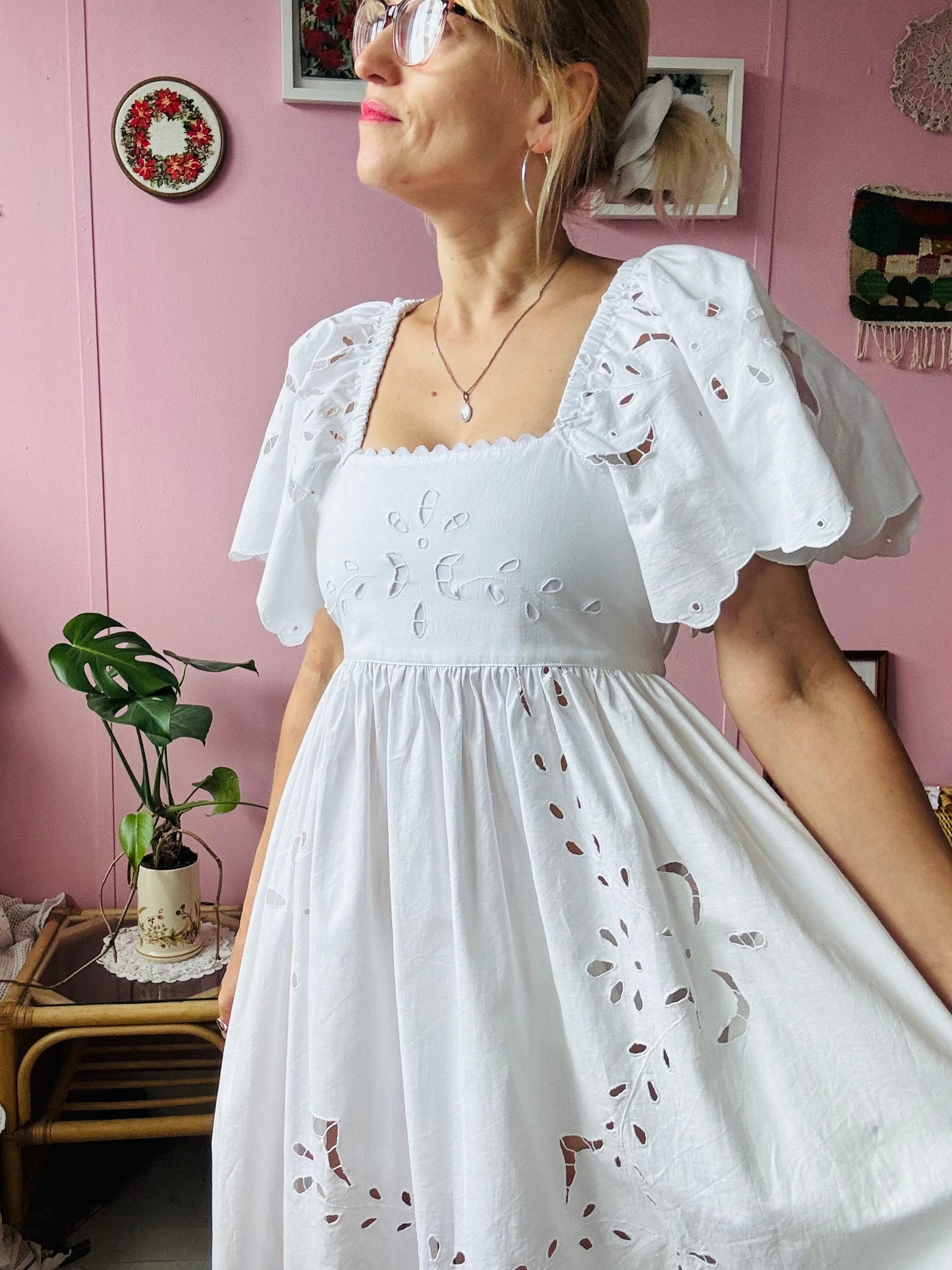 All white maxi dress with cut out embroidery