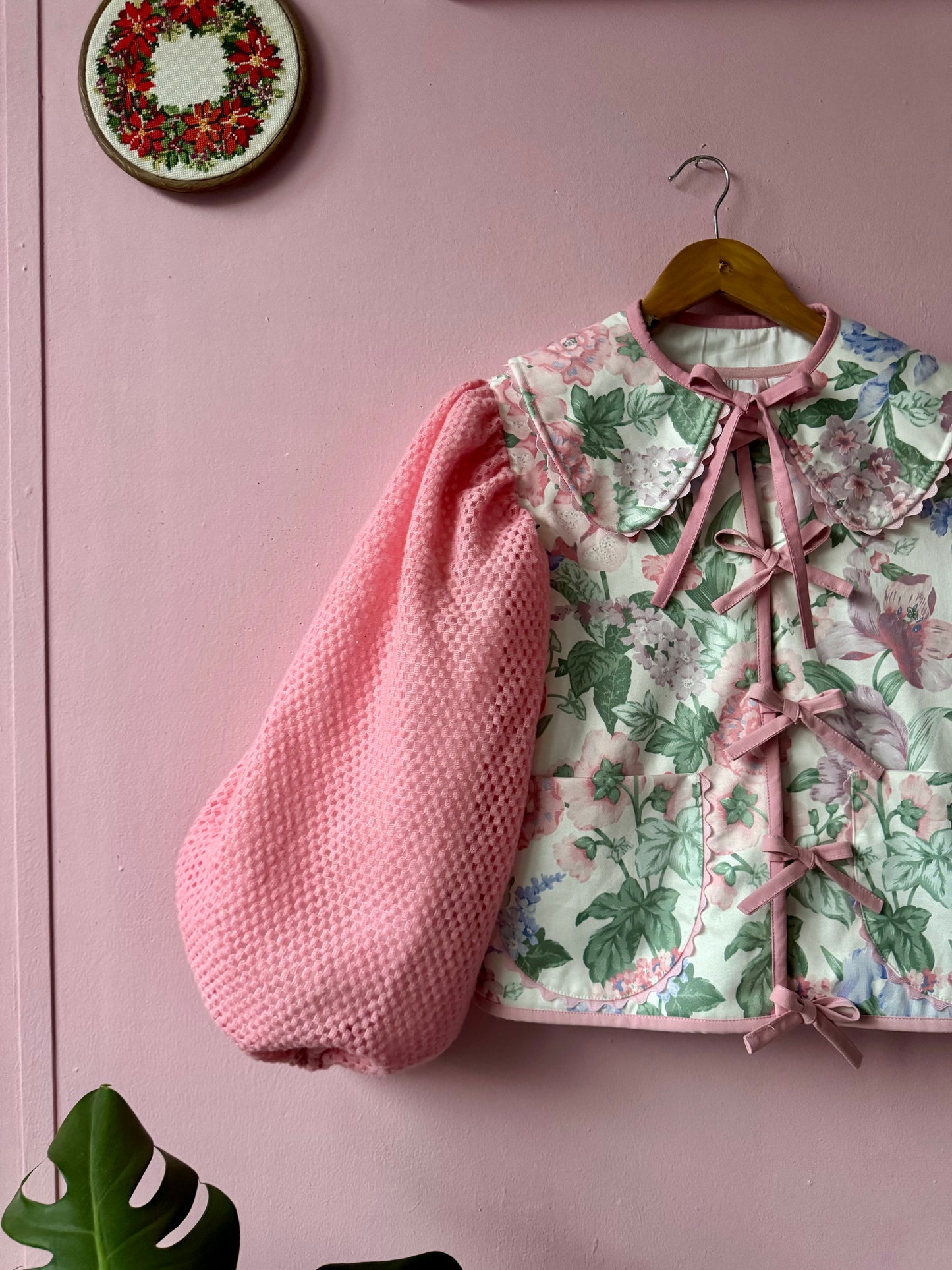 Floral jacket with pink sleeves