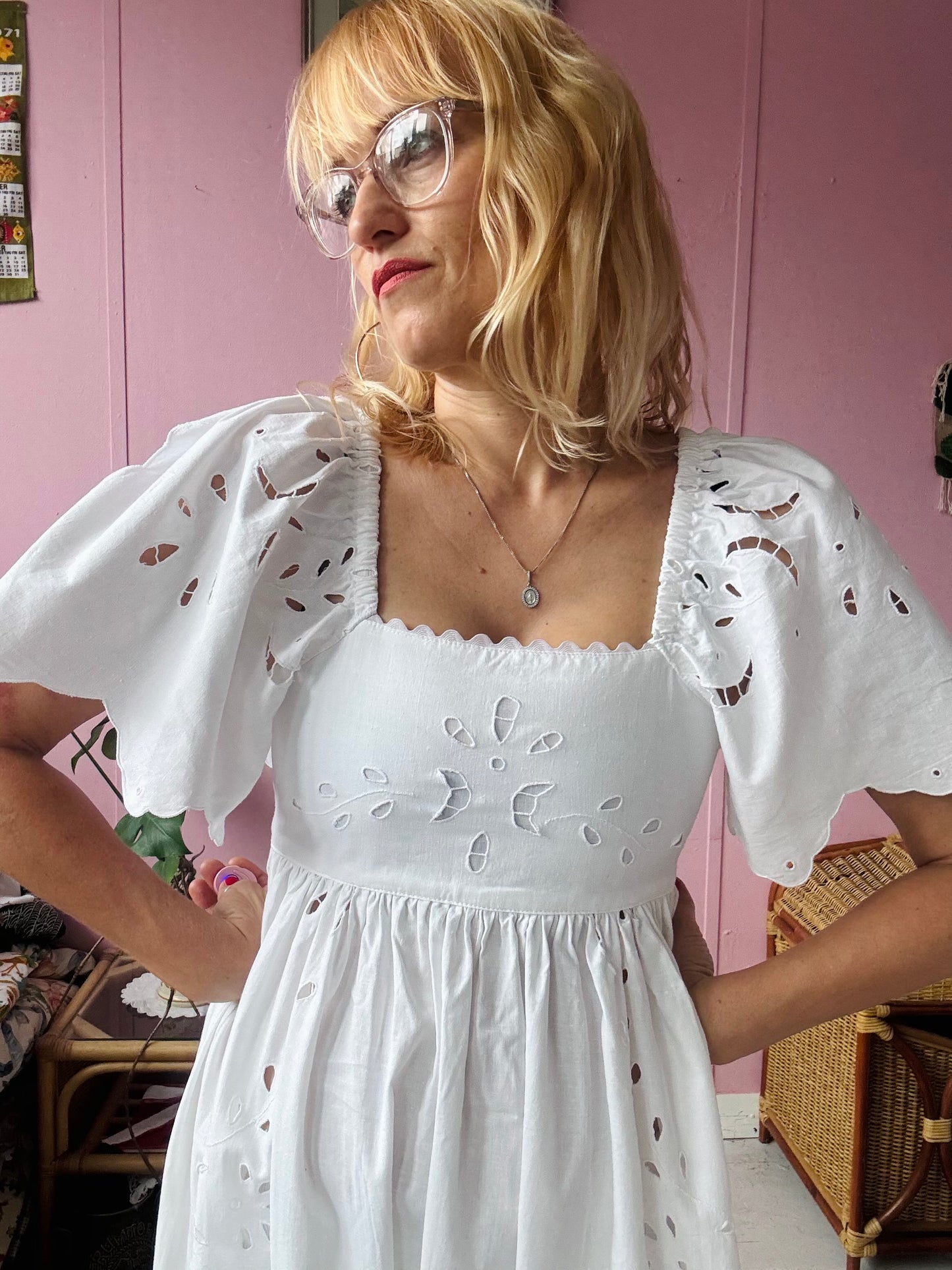 All white maxi dress with cut out embroidery