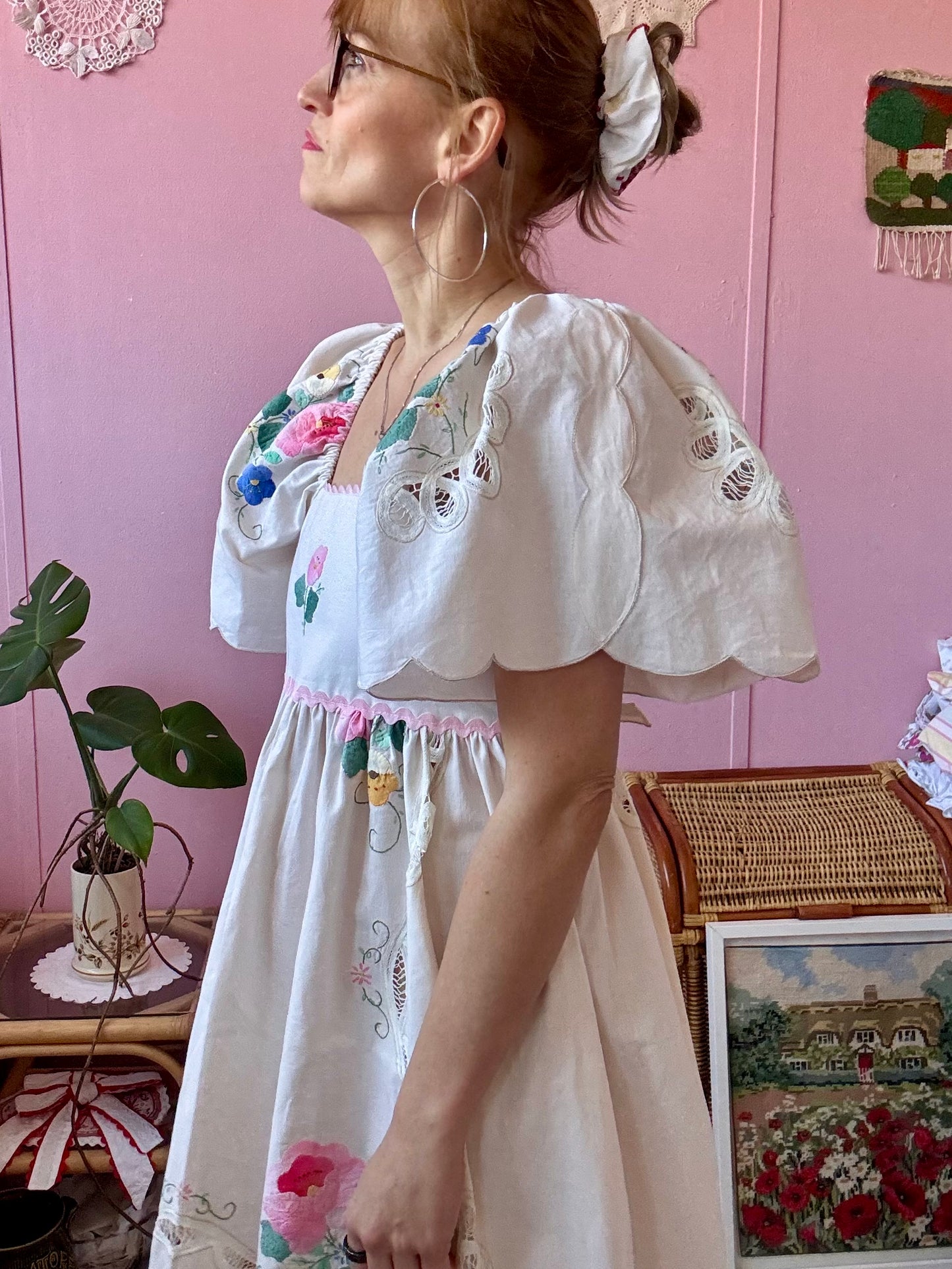 Cream maxi dress with floral appliqués