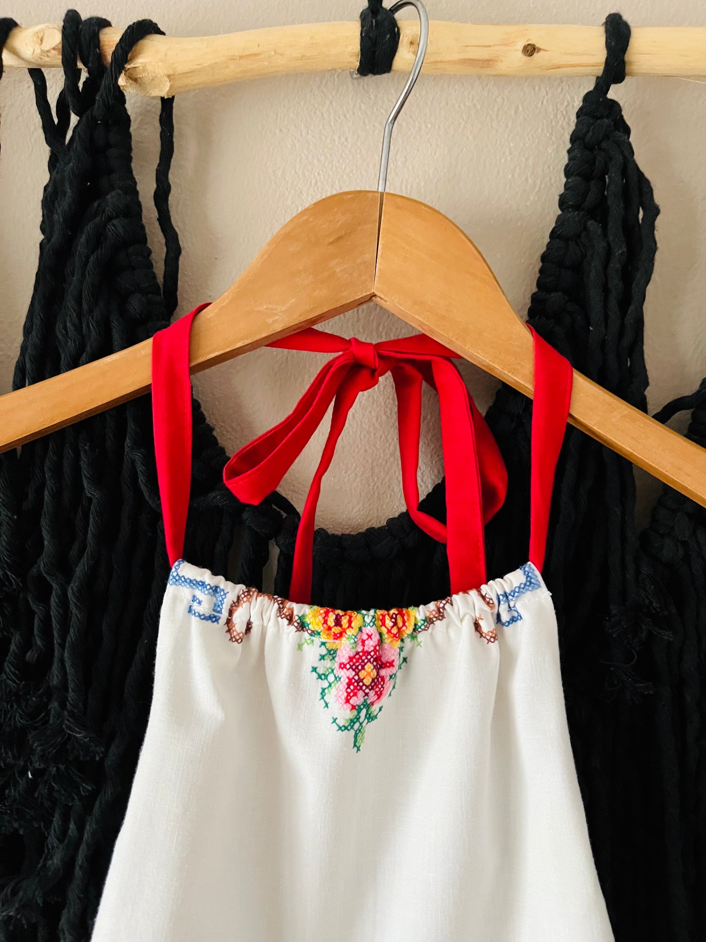 Cross stitch halter neck top with blue gingham back straps and frill